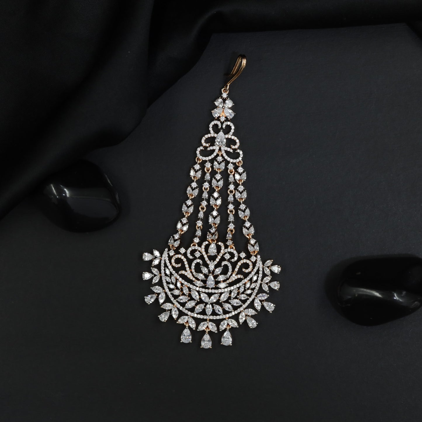 Rose Gold Jhumar Featuring Cascading Tassels and Floral Scrollwork