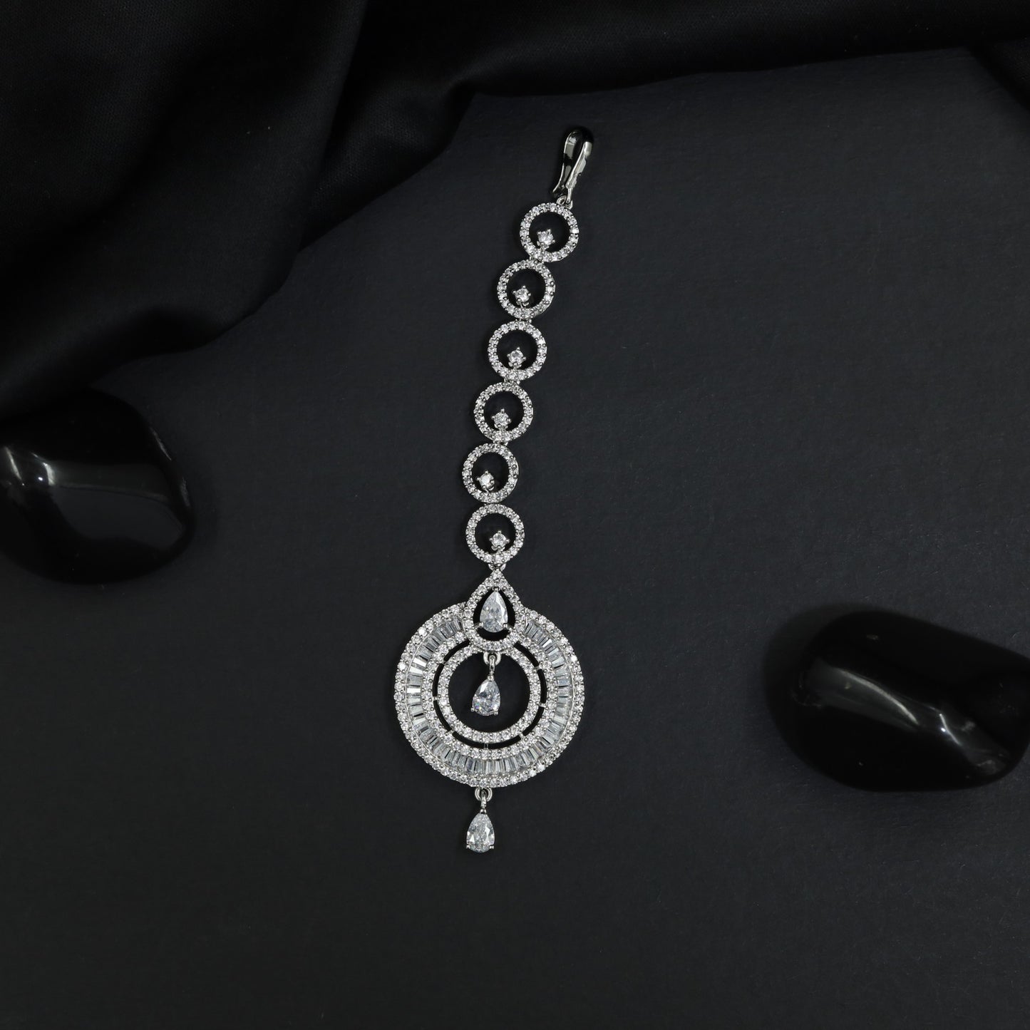Tikka Featuring Open Circle Pattern and Decorative Drops