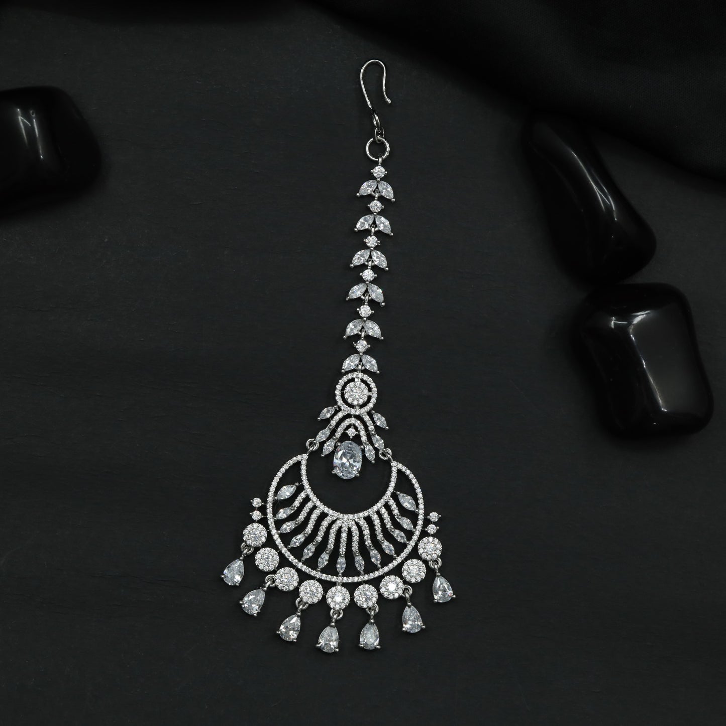 Tikka Featuring Layered Crescent Motifs and Fringe Detail