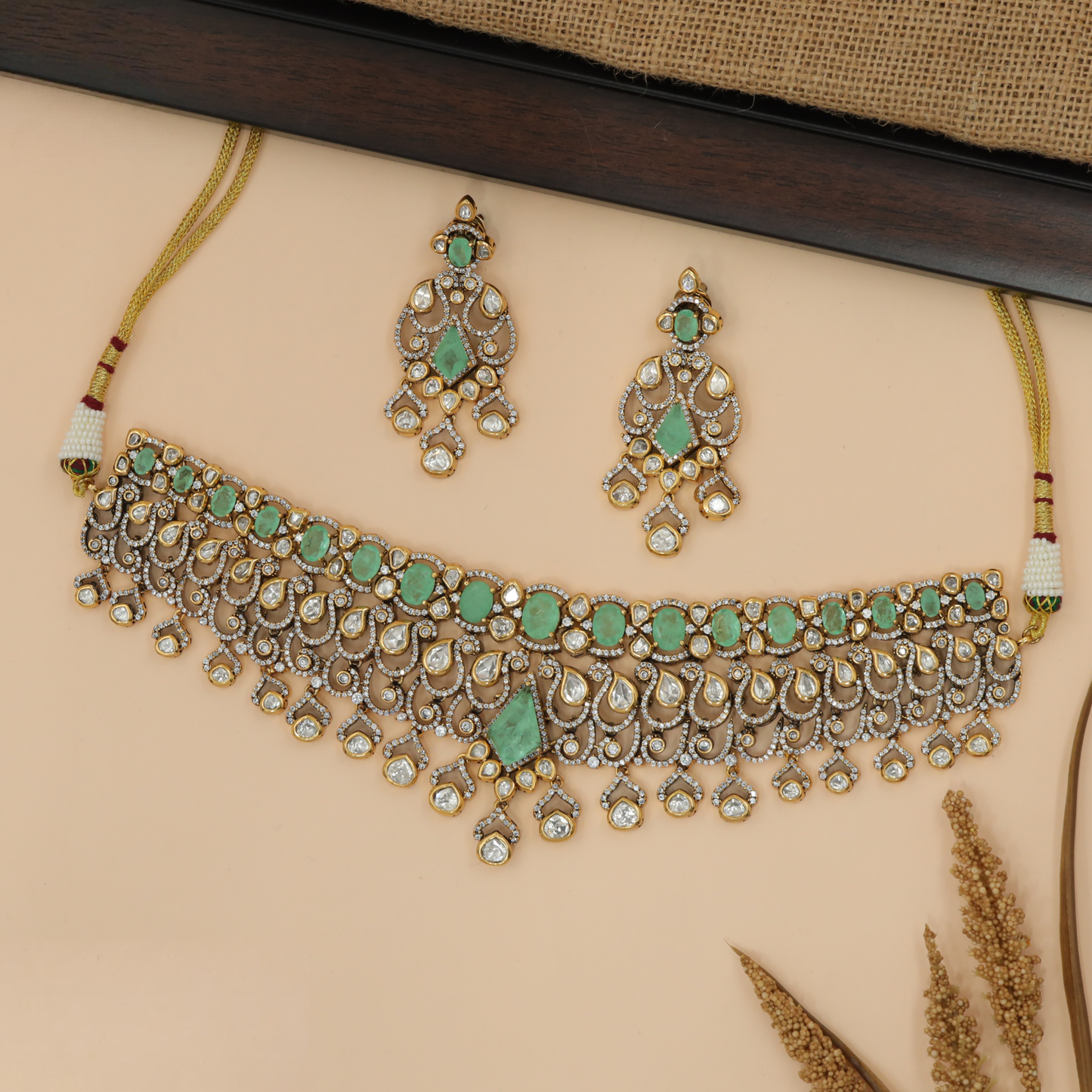 Designer Kundan choker set with ornate layered highlights