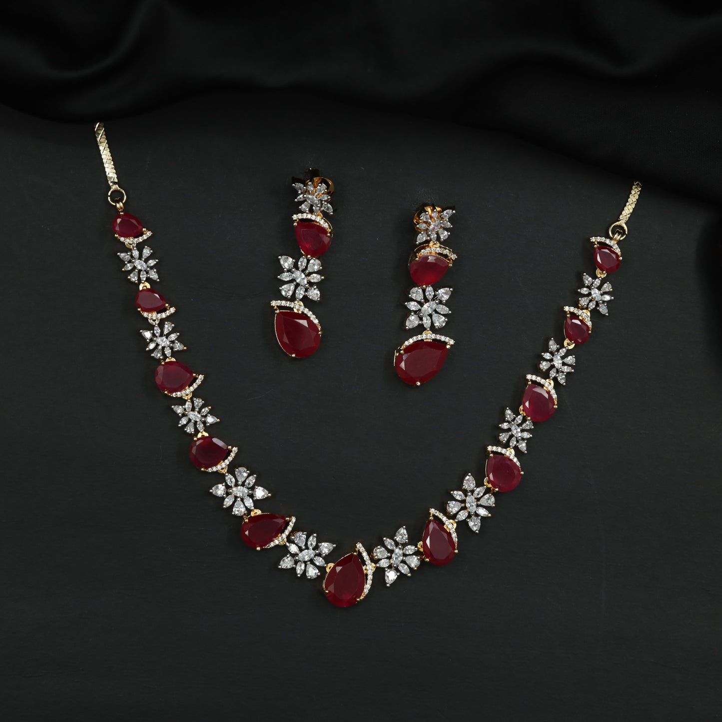 Necklace Featuring Alternating Floral Clusters and Pear Elements