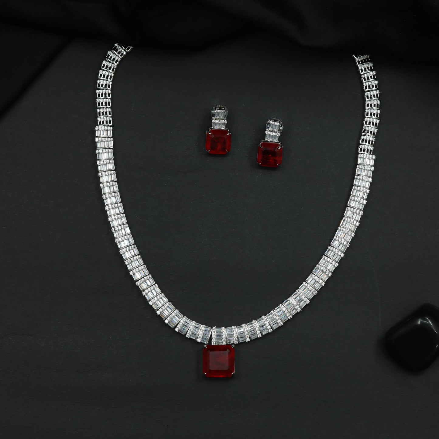 Statement Necklace with Baguette Links and Decorative Pendant