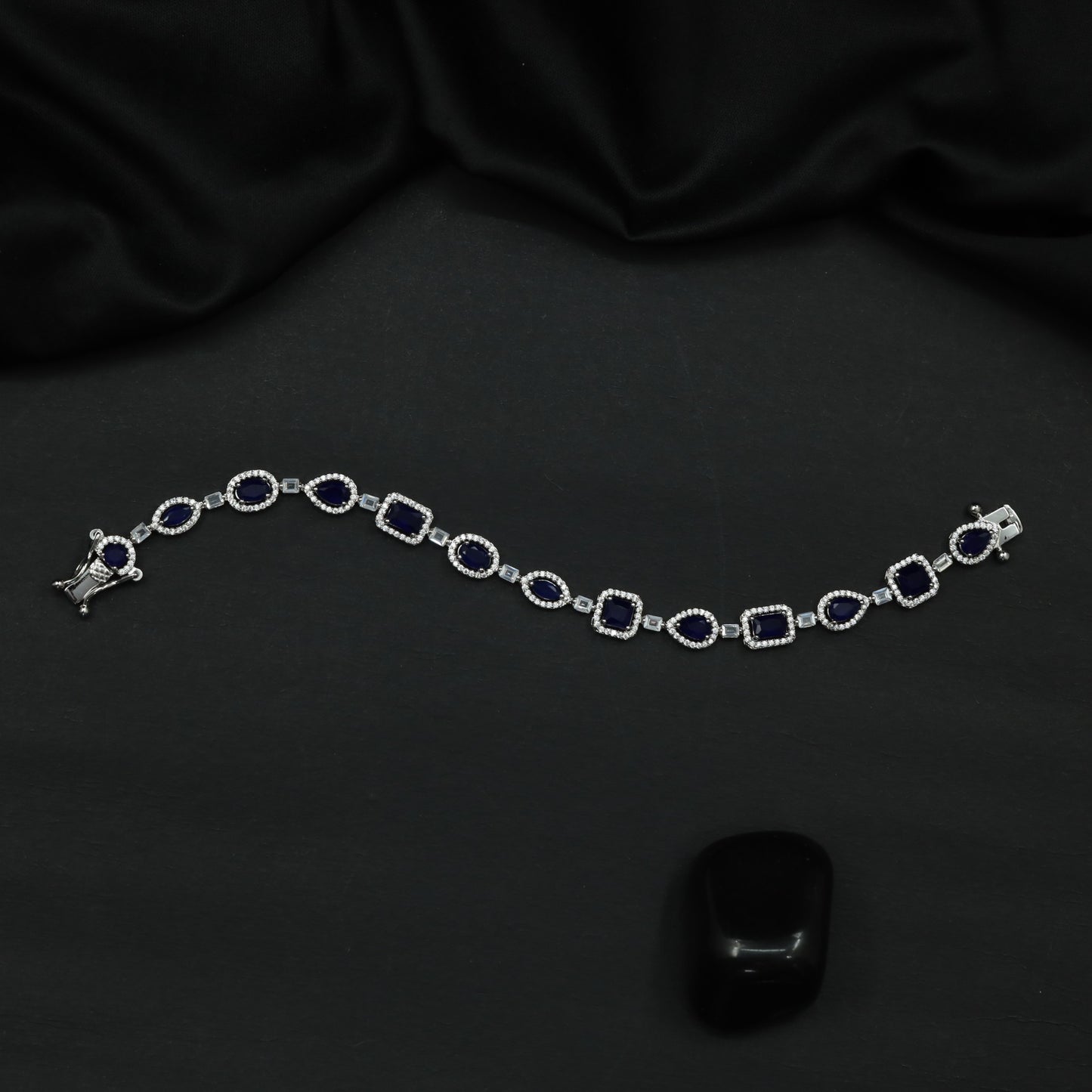 Rhodium Bracelet with Framed Cushion Links and Leaf Details