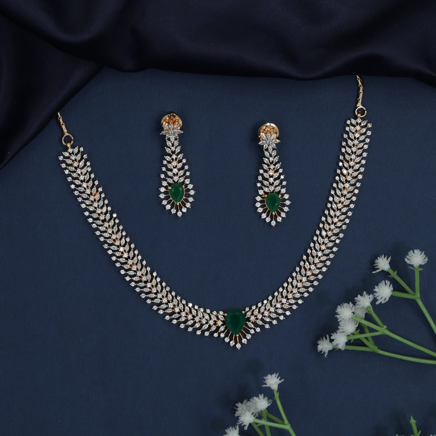Statement Necklace with Layered Row Construction and Center Drop