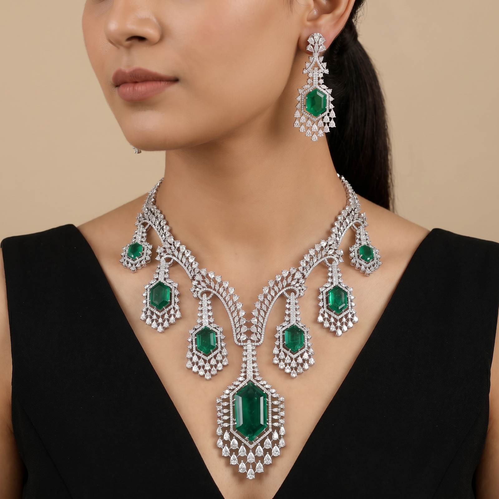 Rhodium necklace with chandelier drop silhouette and teardrop centerpiece