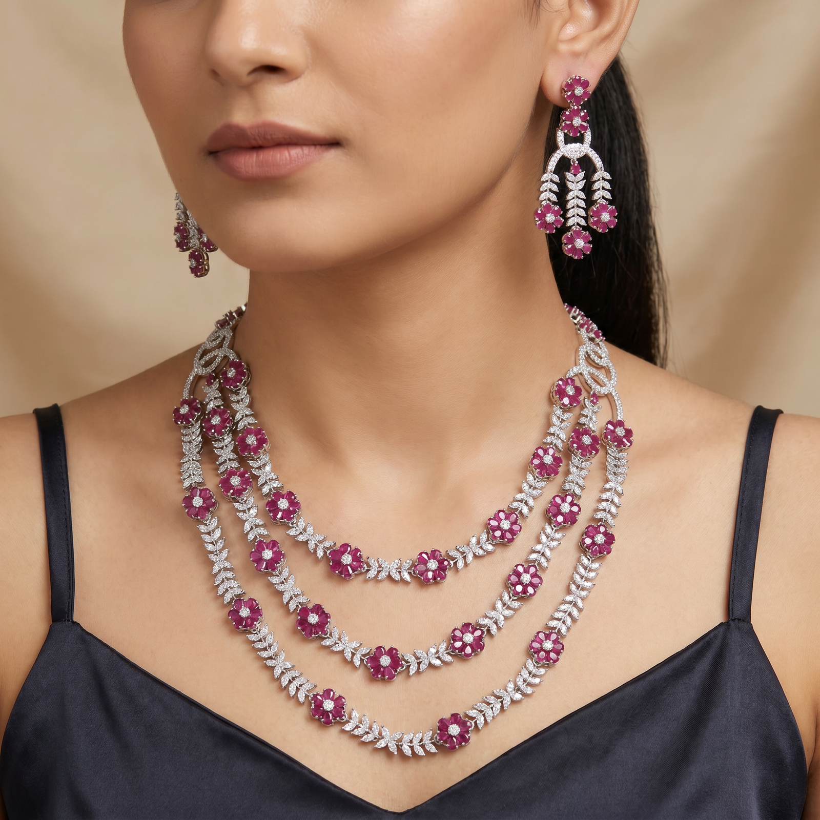Triple Strand Rhodium Necklace with Floral Spacer Detailing