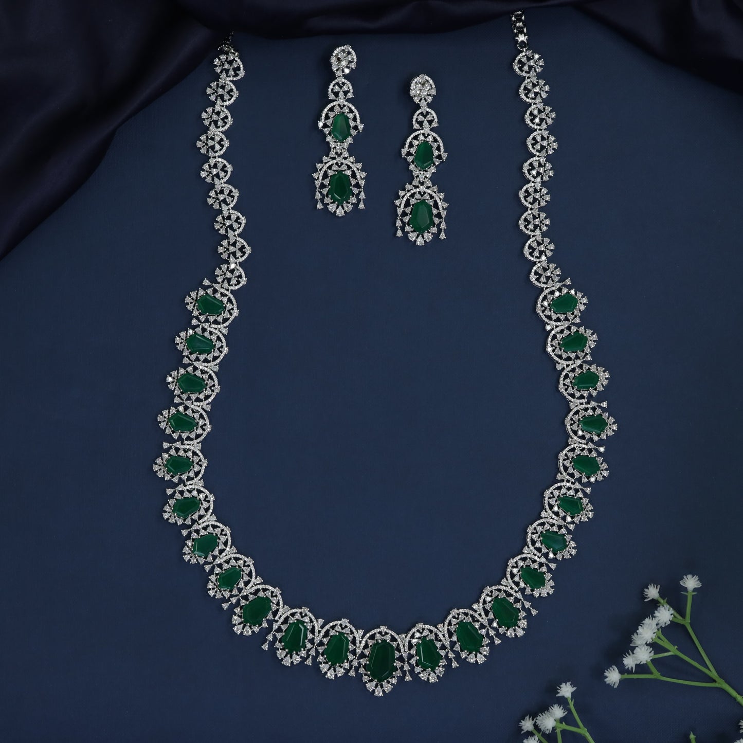 Floral link long haara with graduated oval arrangement