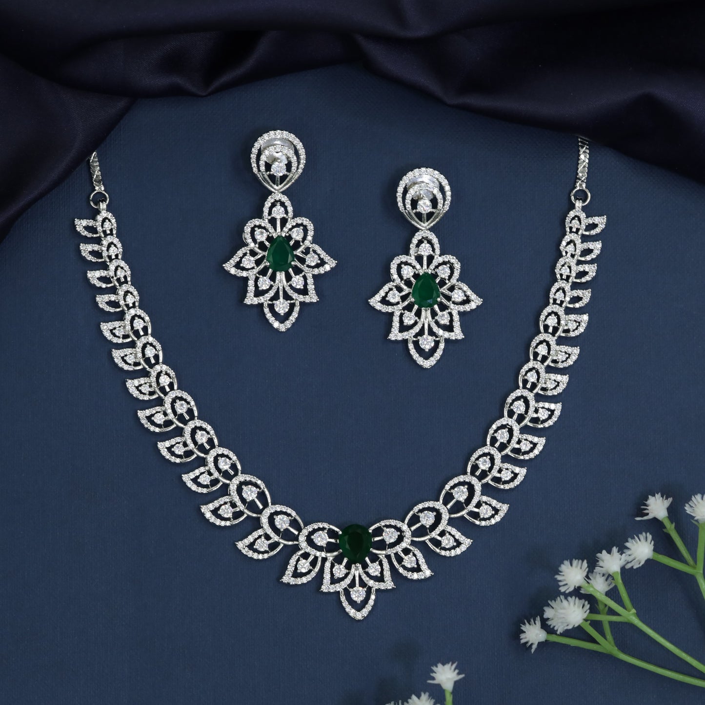Leaf pattern necklace with floral centerpiece design