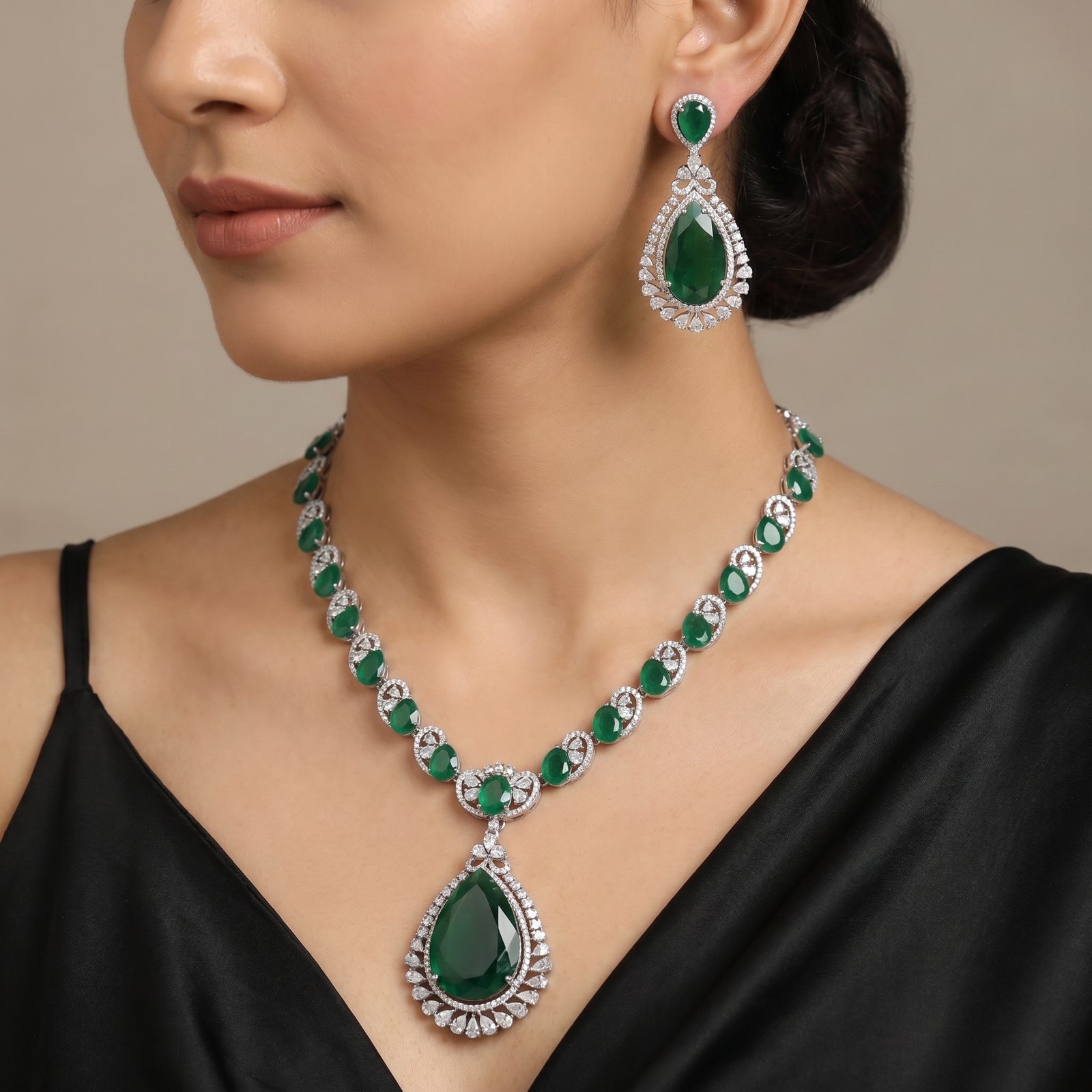 Necklace with Pavilion Pendant Focus and Infinity Linkwork Detailing