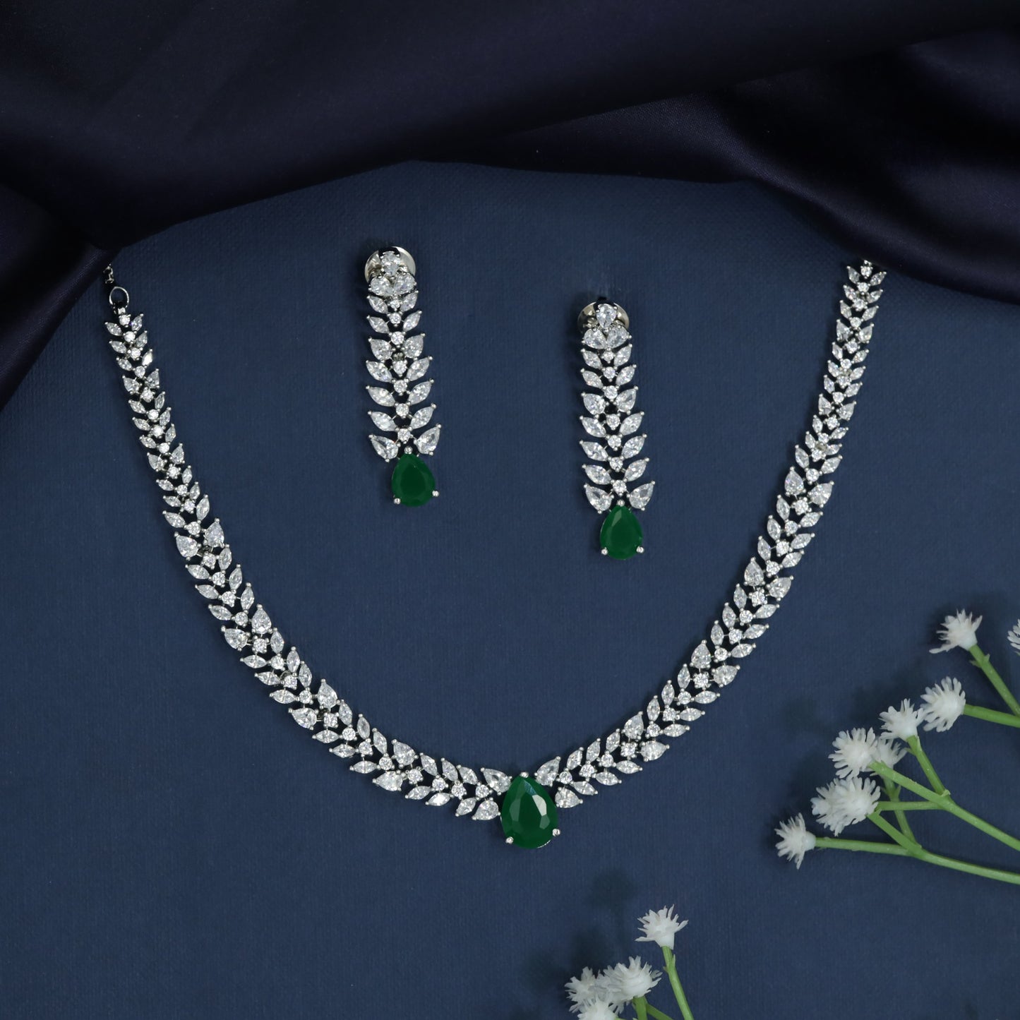 Necklace with Chevron Spine Construction and Pavilion Accent