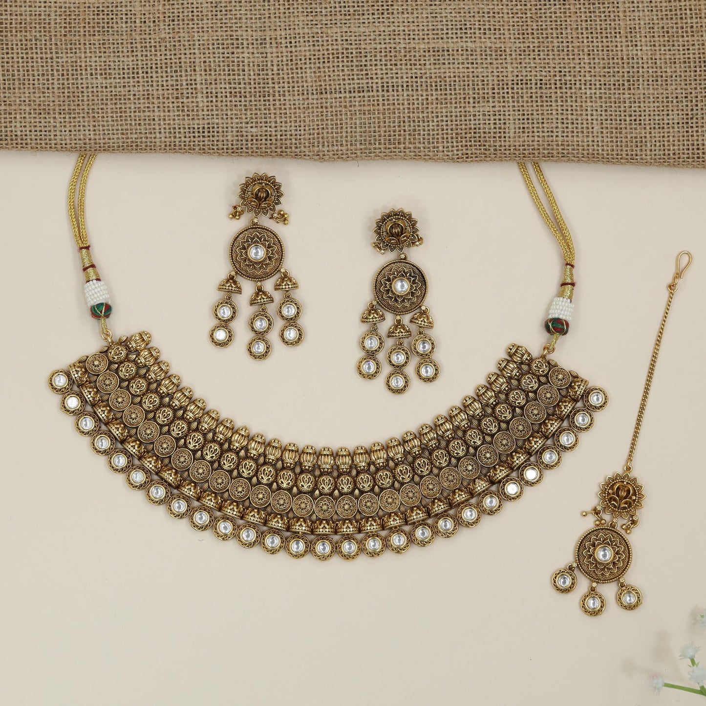 Designer devotional coin choker with layered ornamental borders