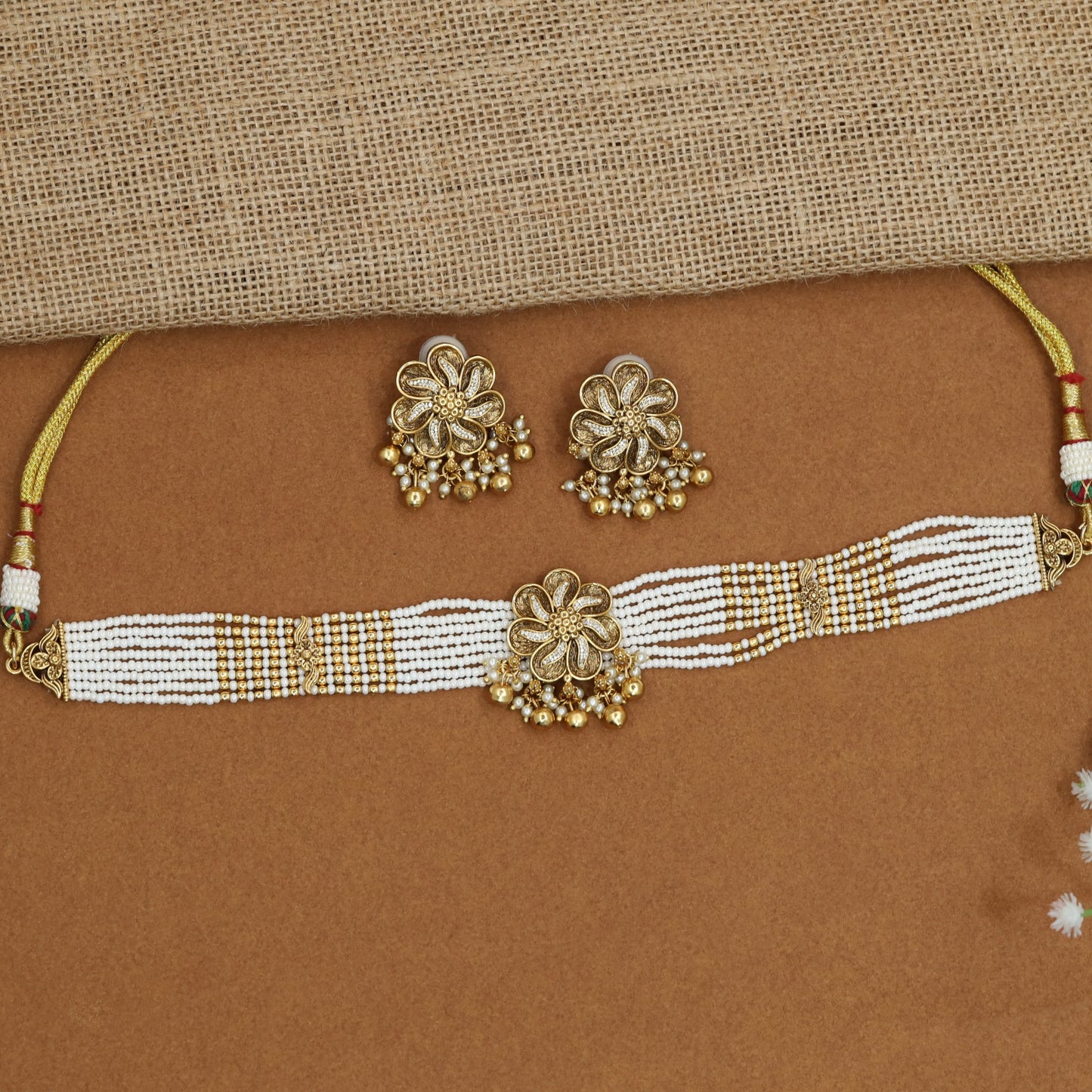 Signature rosette beads choker with ornamental floral craftsmanship
