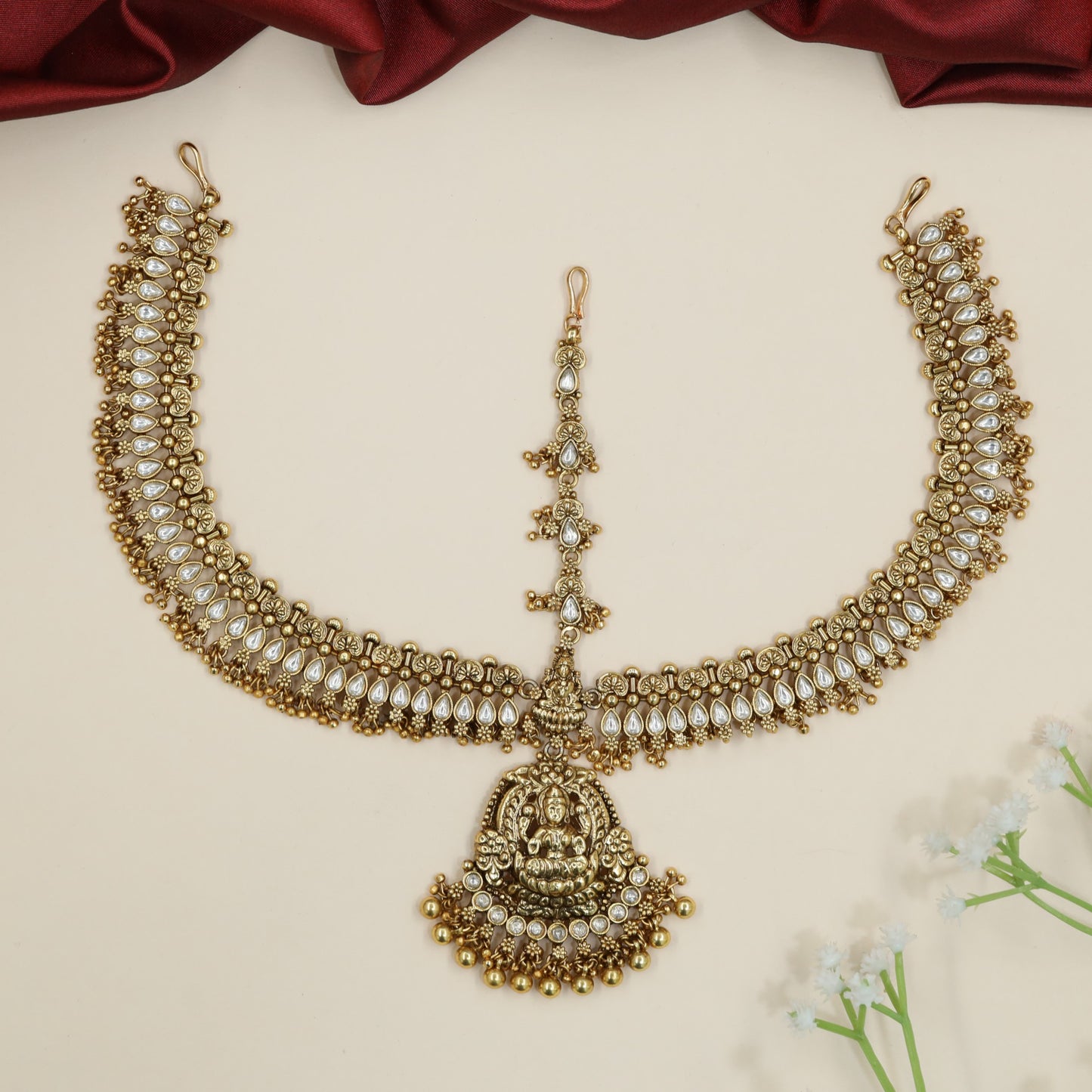 Bridal lakshmi motif matha patti with dangling cluster drops