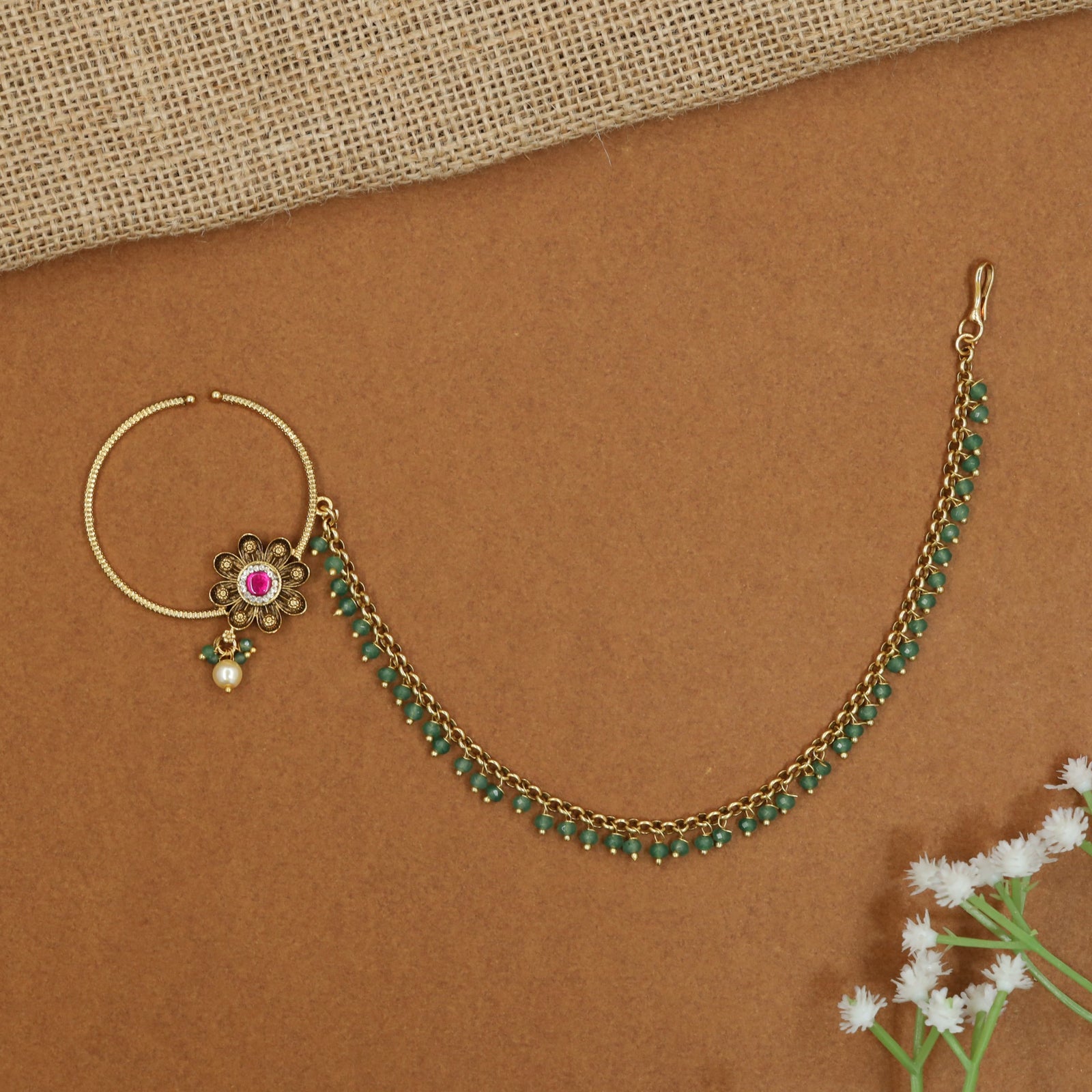 Antique Nath with floral centrepiece and pearl chain border