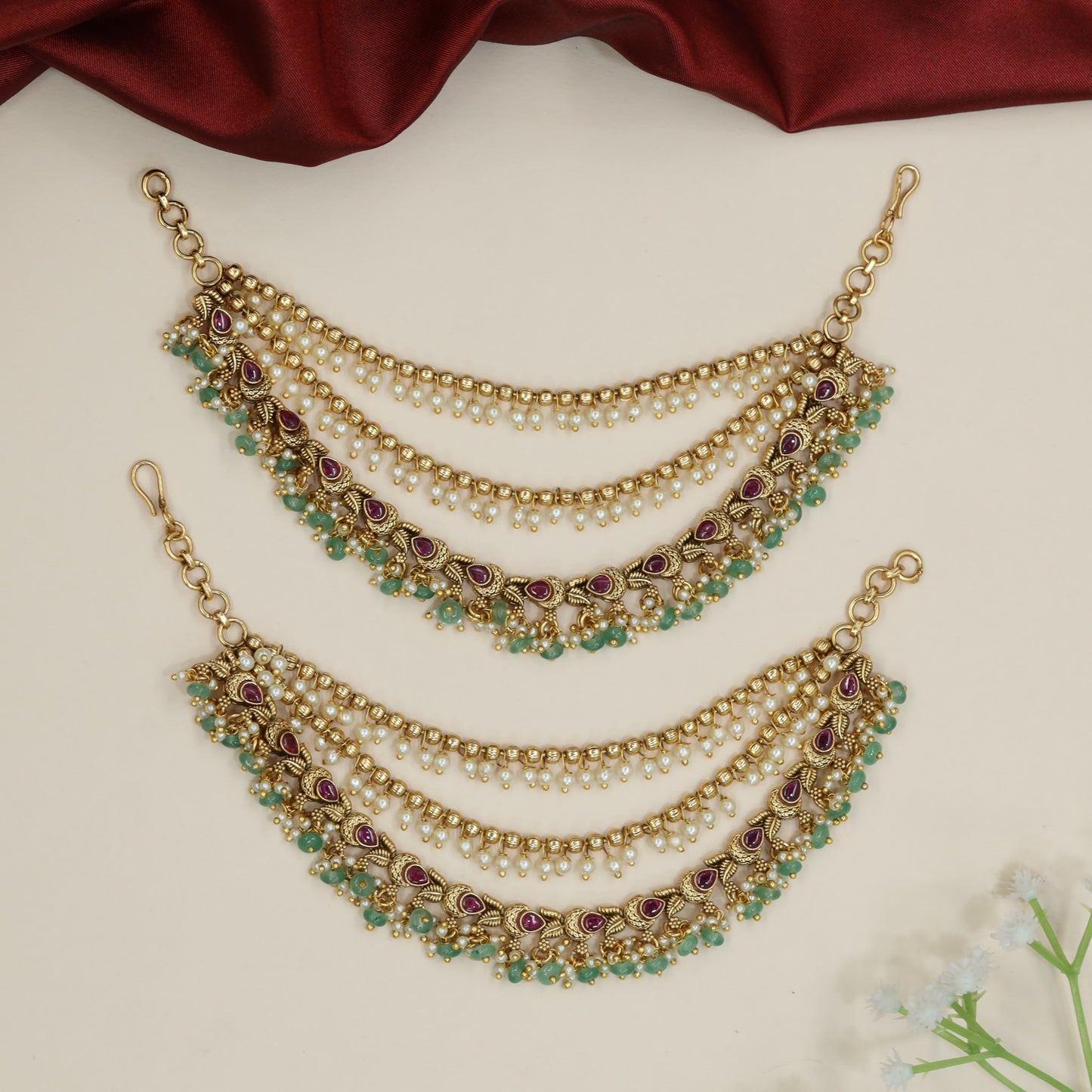 Classic Antique Mati with elegant cascading chain arrangement