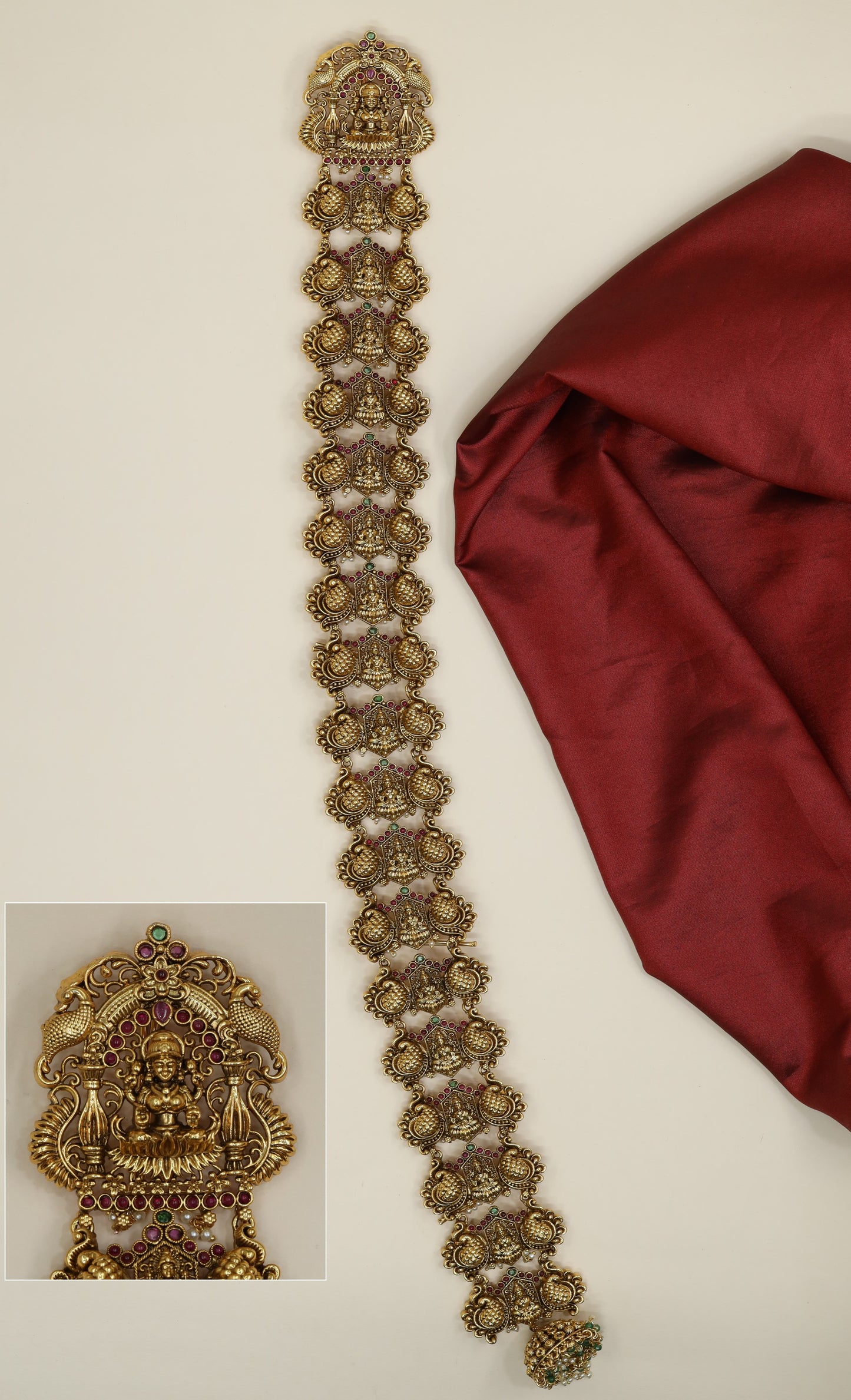 Traditional Lakshmi long jade featuring ornate floral connectors