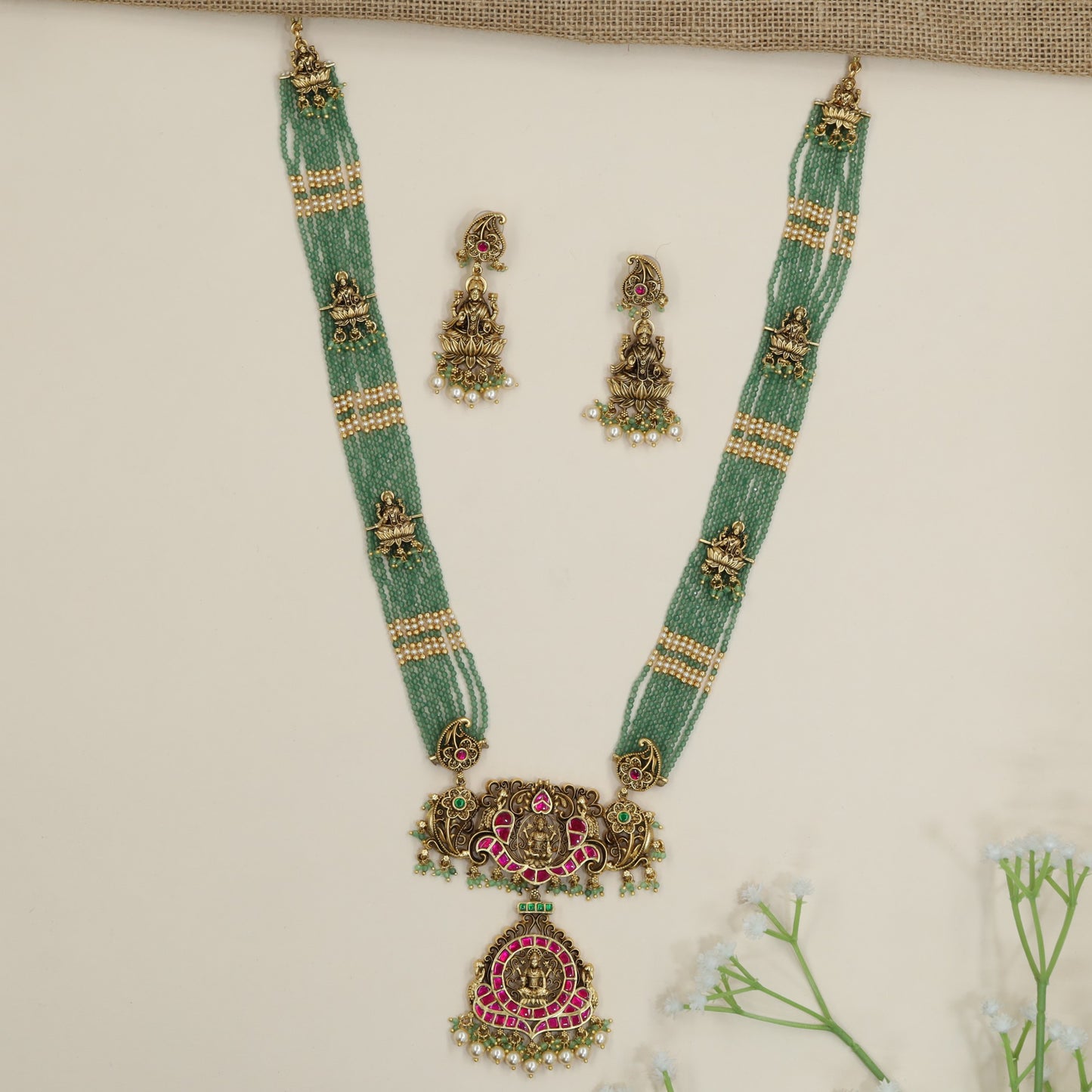 Regal Lakshmi pendant beads long haara with temple motif accents