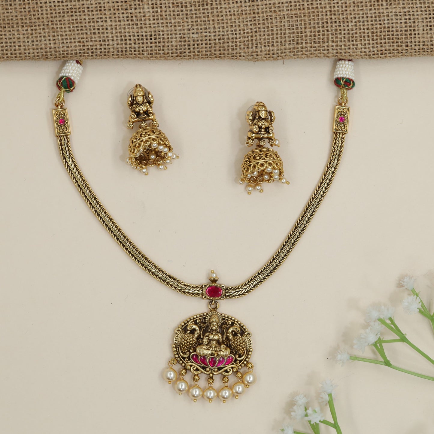 Antique Lakshmi pendant necklace with braided chain design