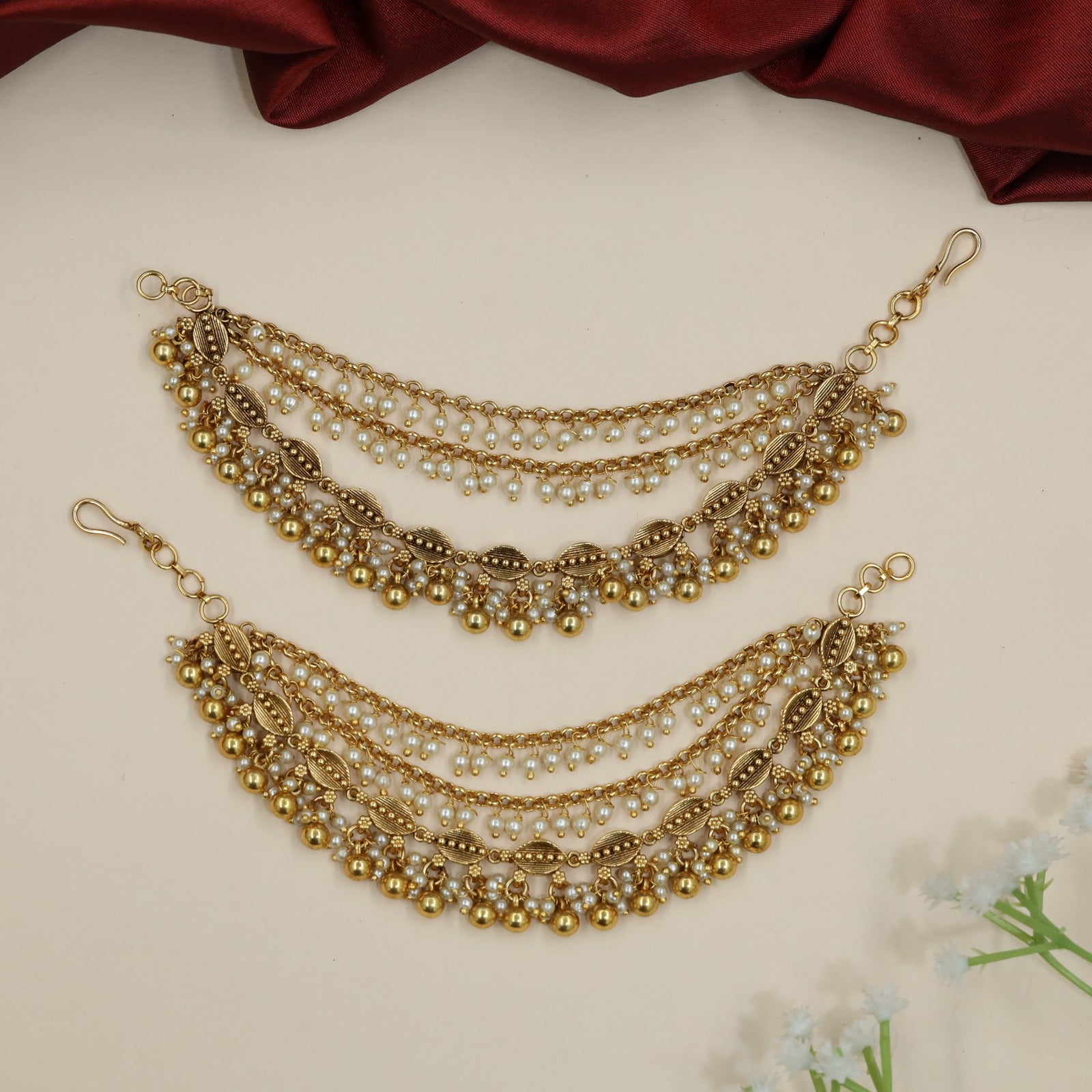Festive Antique Mati Incorporating Articulated Metal Sections and Delicate Links