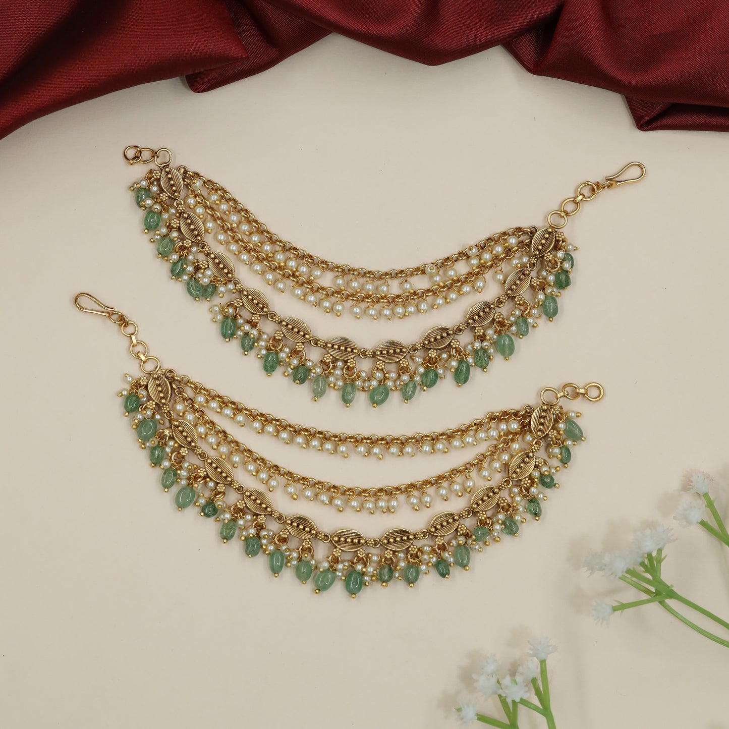 Festive Antique Mati Incorporating Articulated Metal Sections and Delicate Links