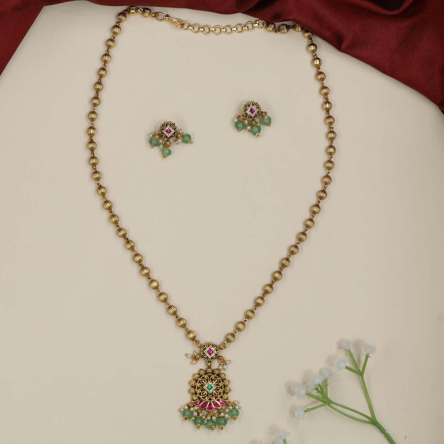 Decorative floral Antique Chain With Pendant with clustered bead drops