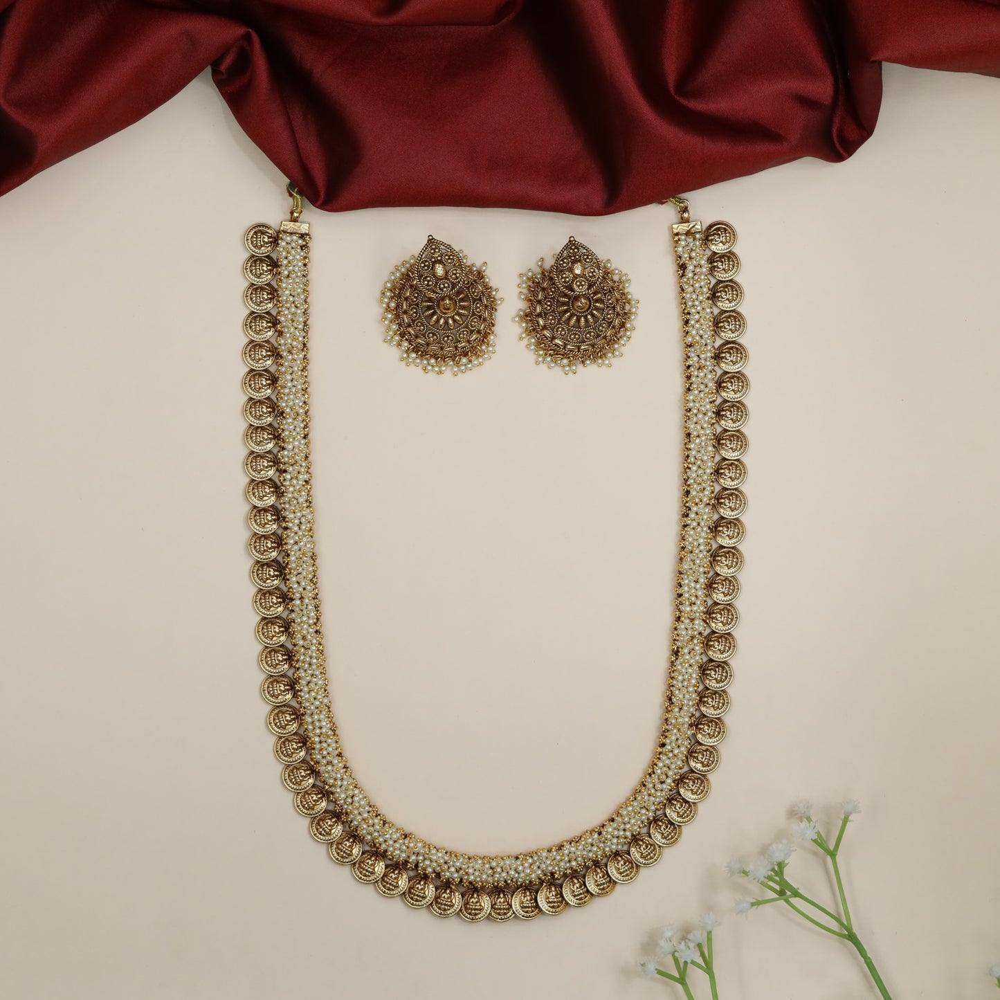 Traditional coin long necklace with intricate pearl strand detailing