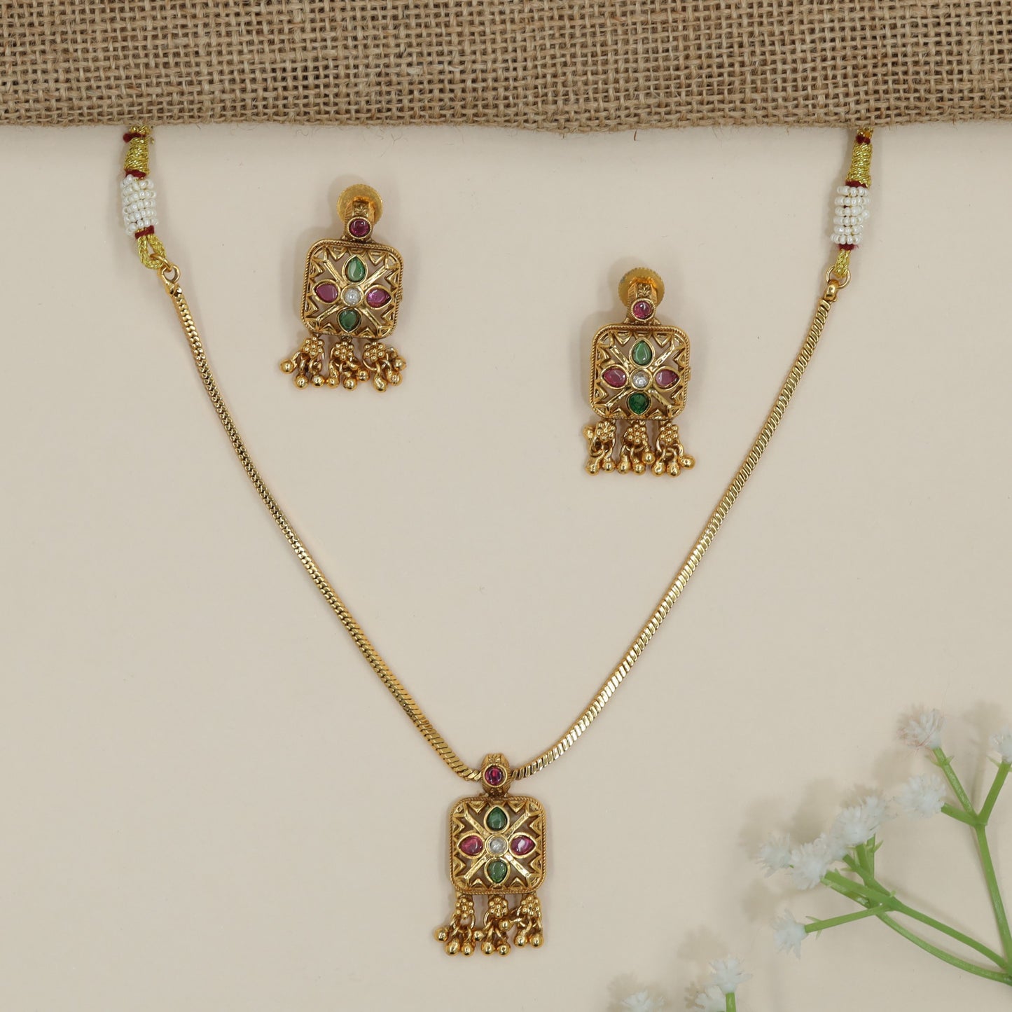 Signature Kundan Necklace Incorporating Uniform Textured Backing and Drop Accents