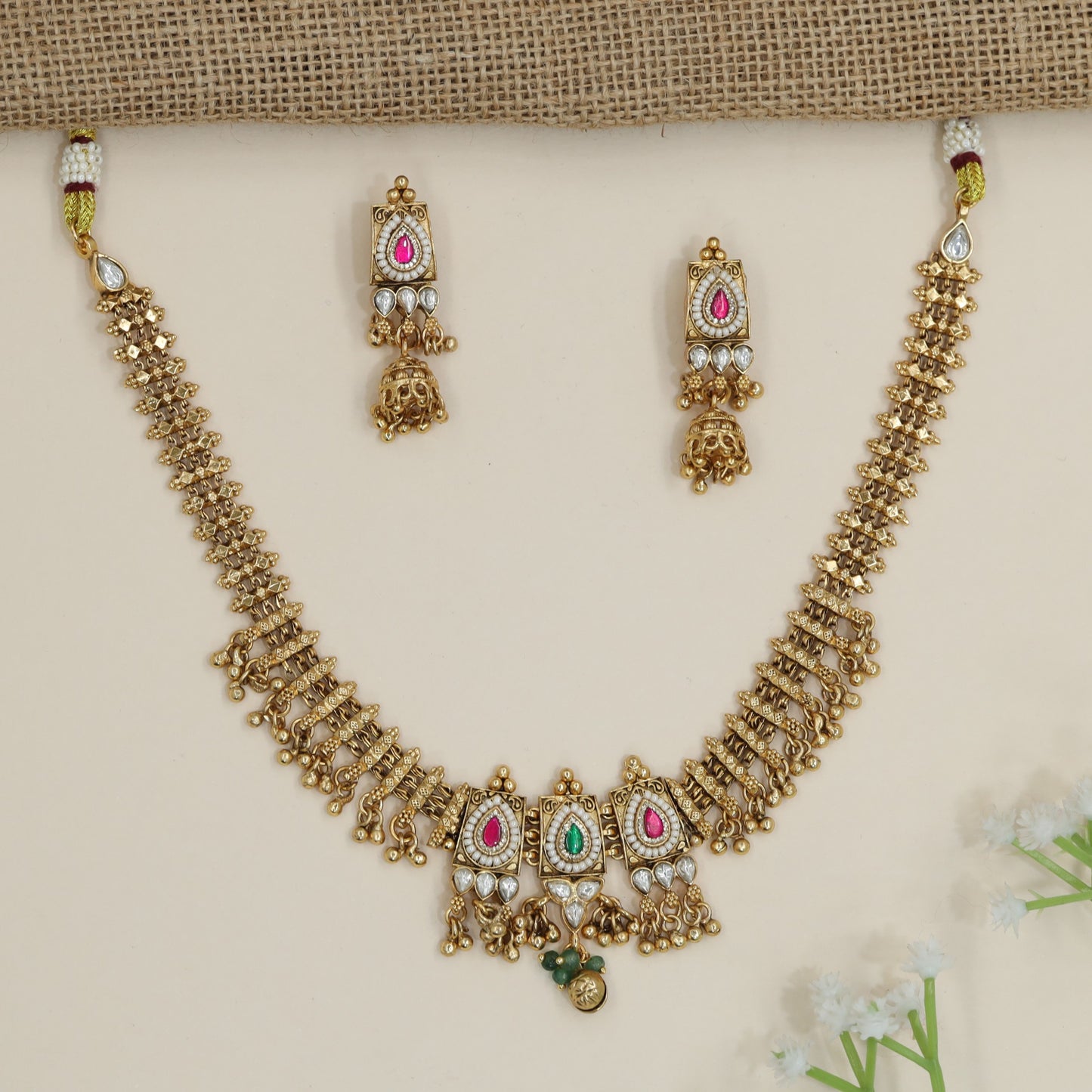 Timeless Kundan necklace set with pendant crown arrangement