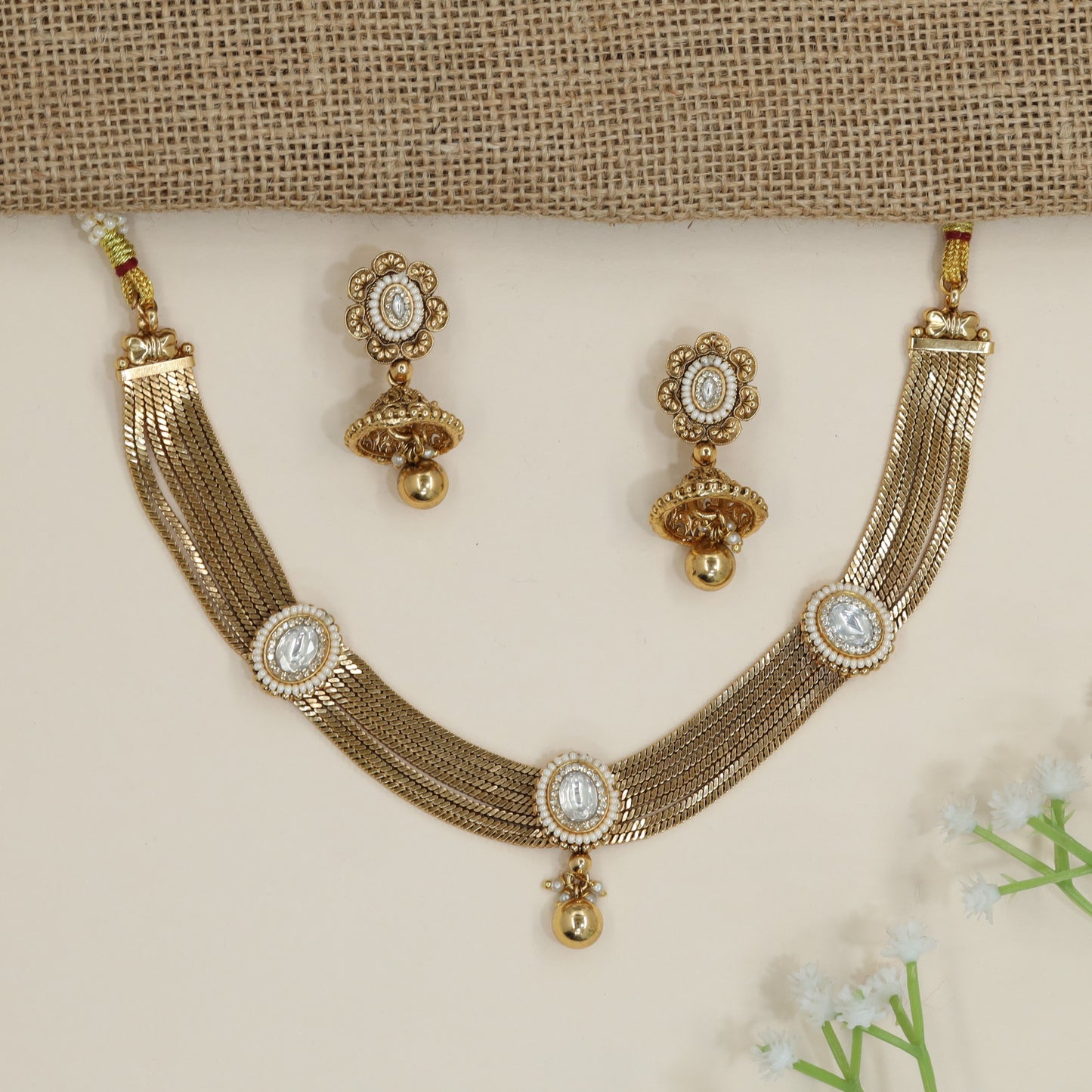 Premium Kundan necklace set showcasing mesh‑style framework