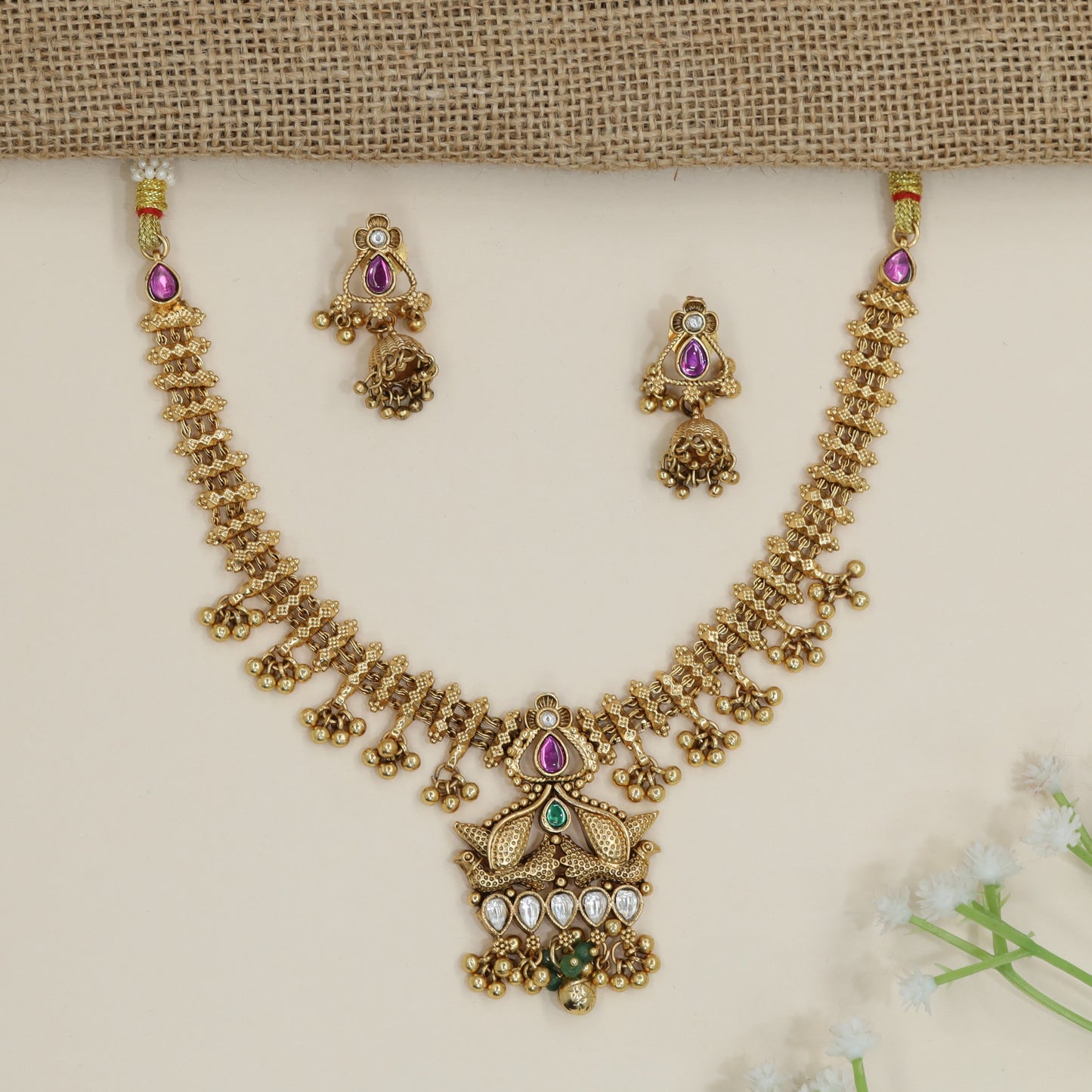 Lotus Pendant Kundan Necklace with Bell Drop Fringe