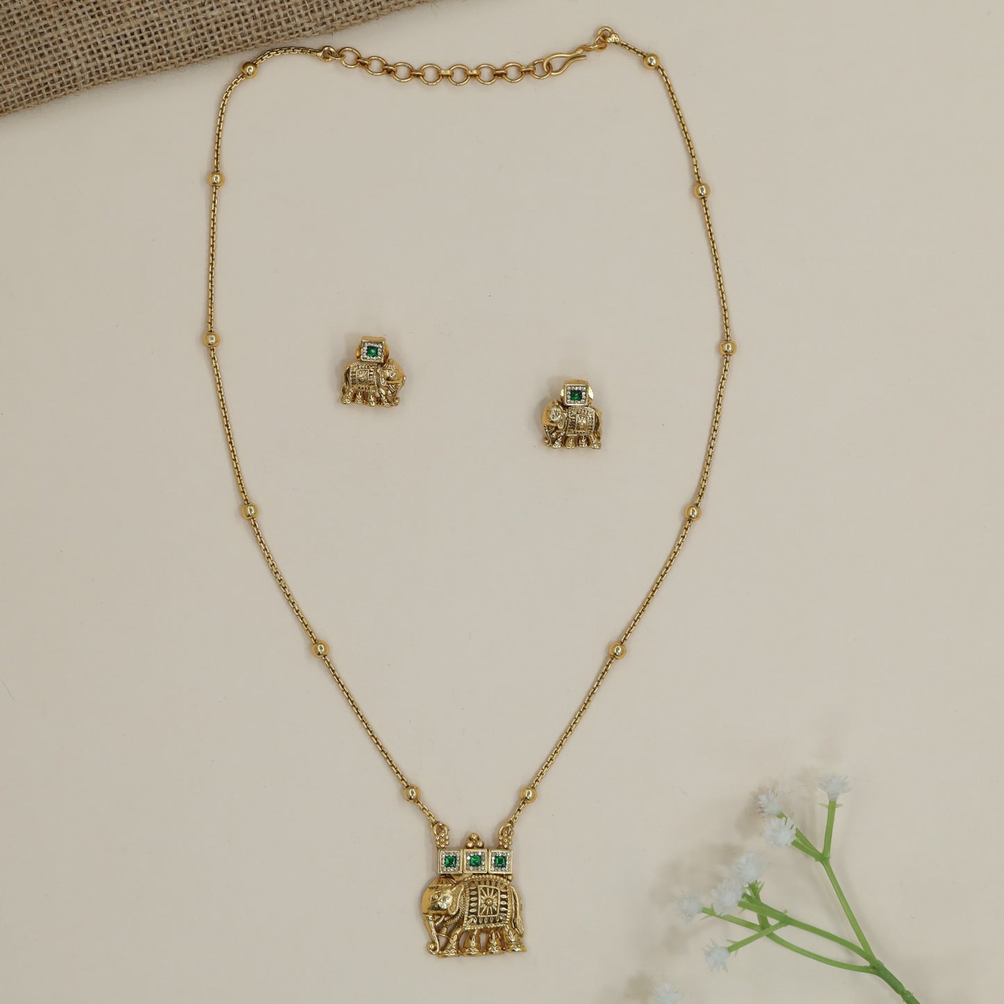 Elephant motif chain pendant with heritage-inspired detailing