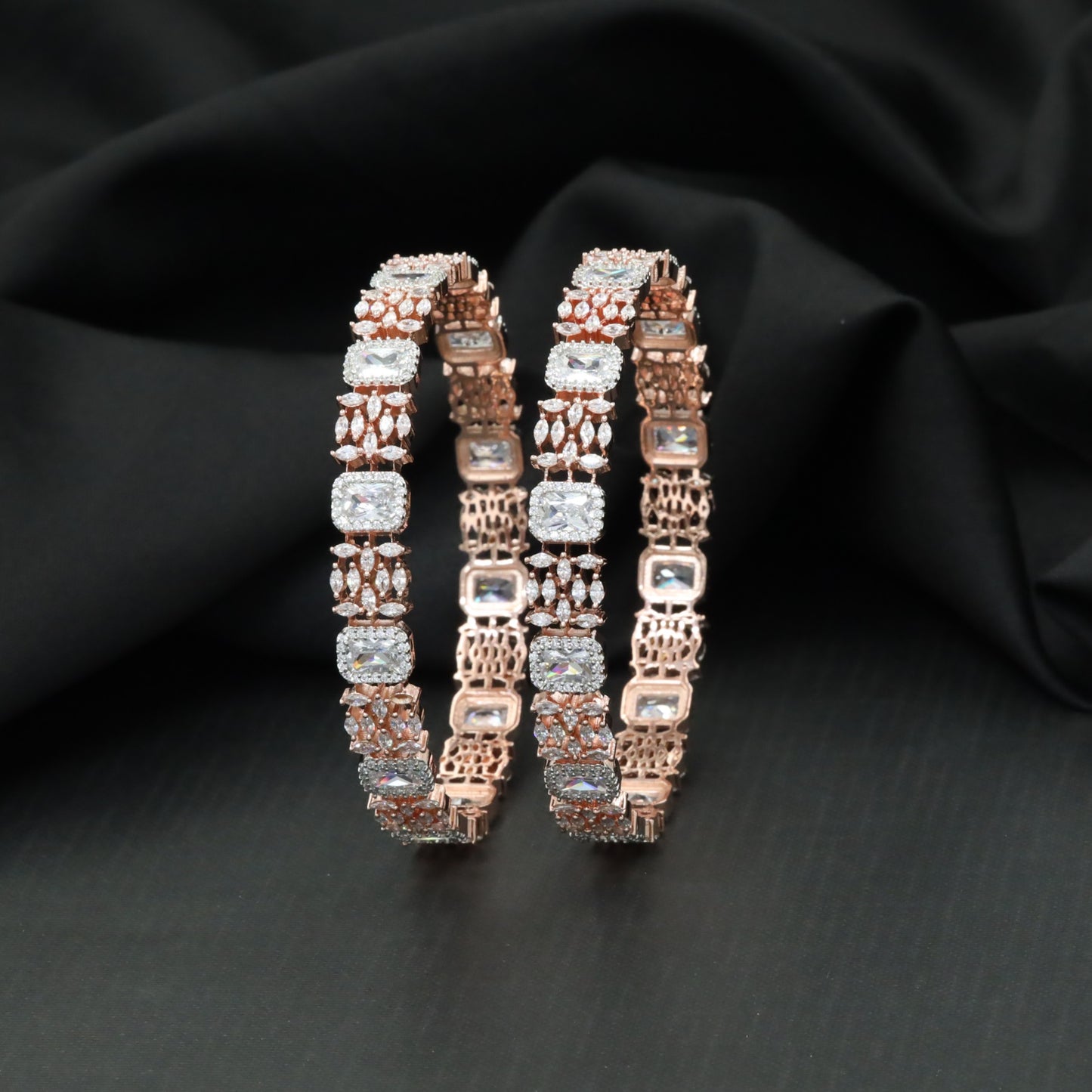 Cushion cut tennis bangles with marquise cluster detailing