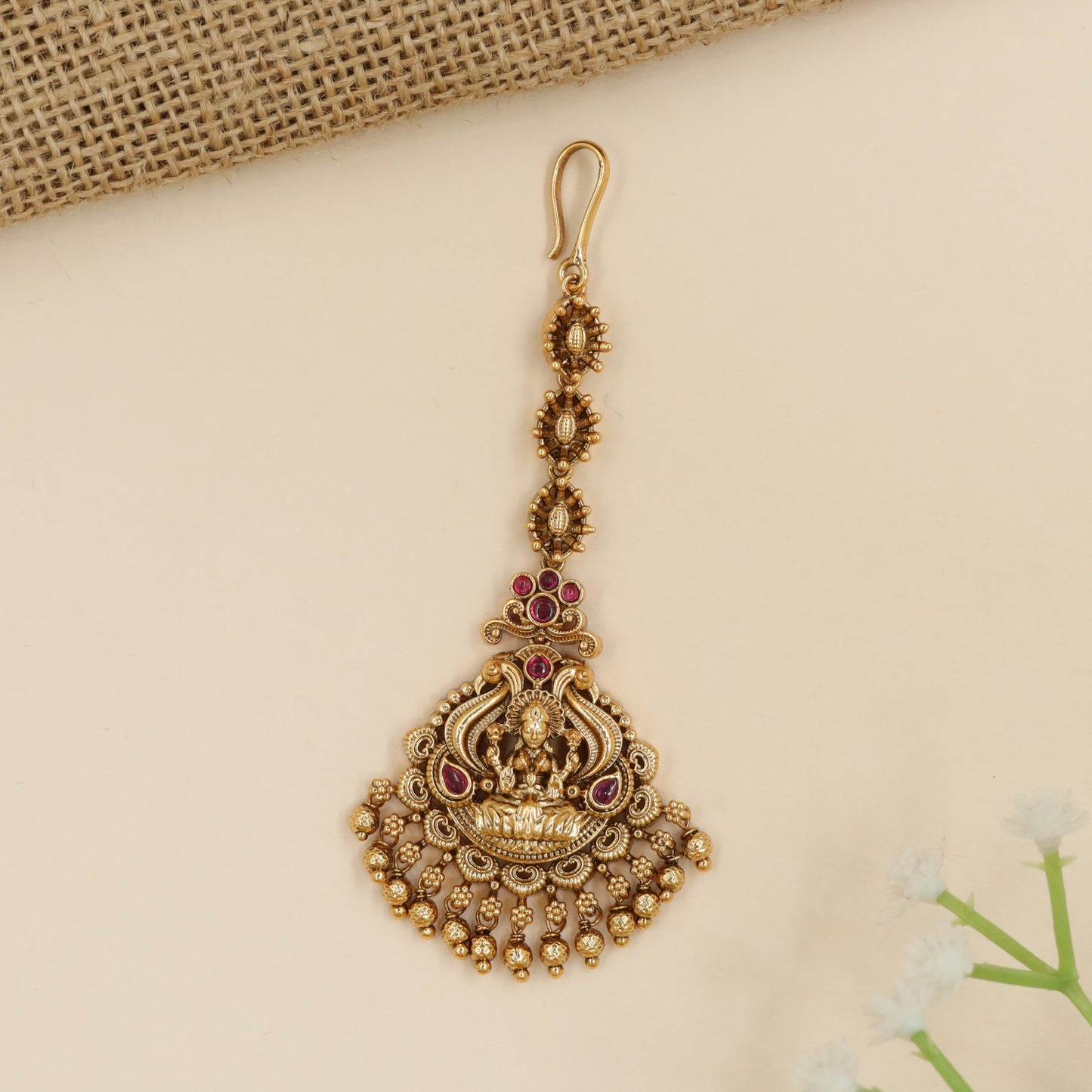 Antique Lakshmi tikka with ornate scrollwork and cascading bead fringe
