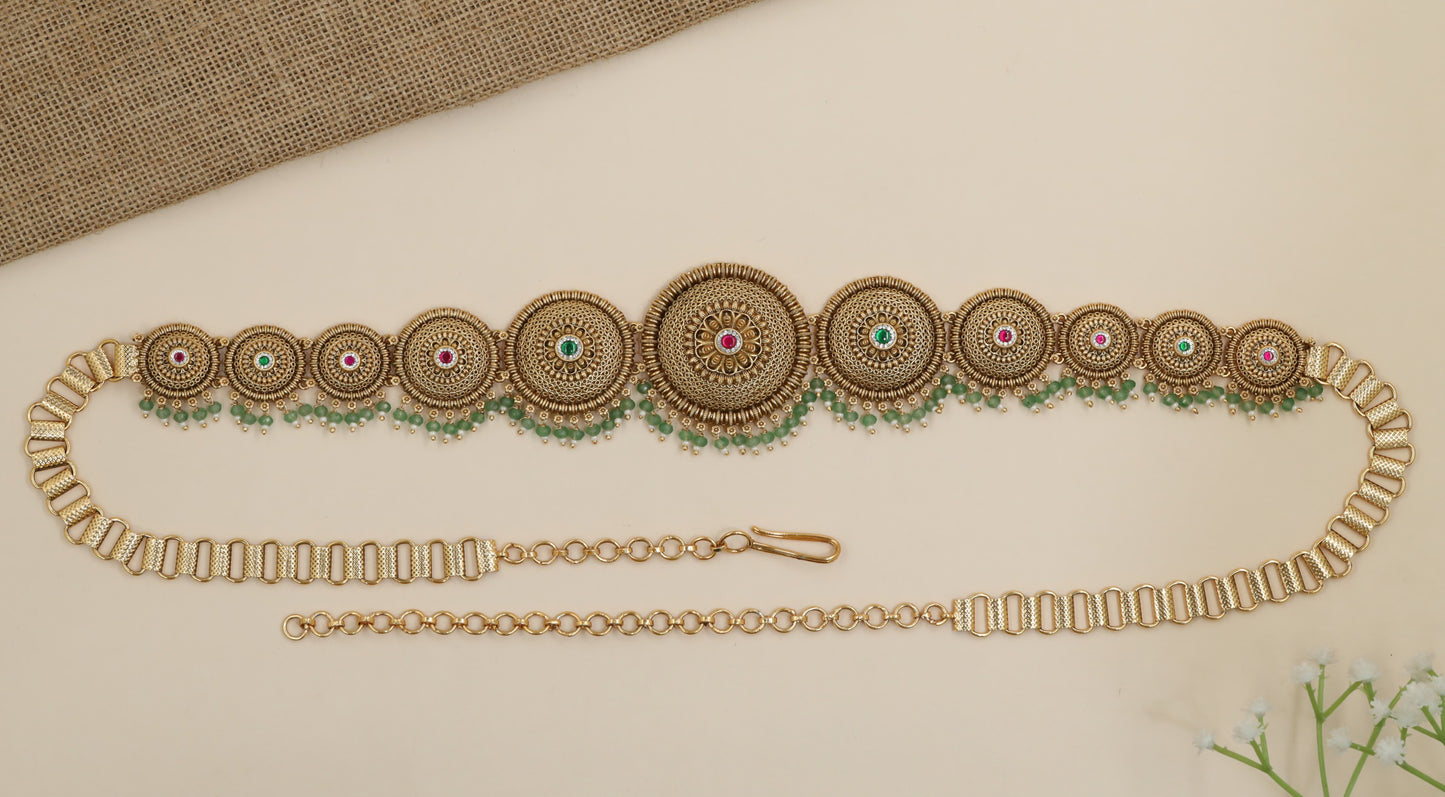 Statement waist belt with graduated medallion craftsmanship
