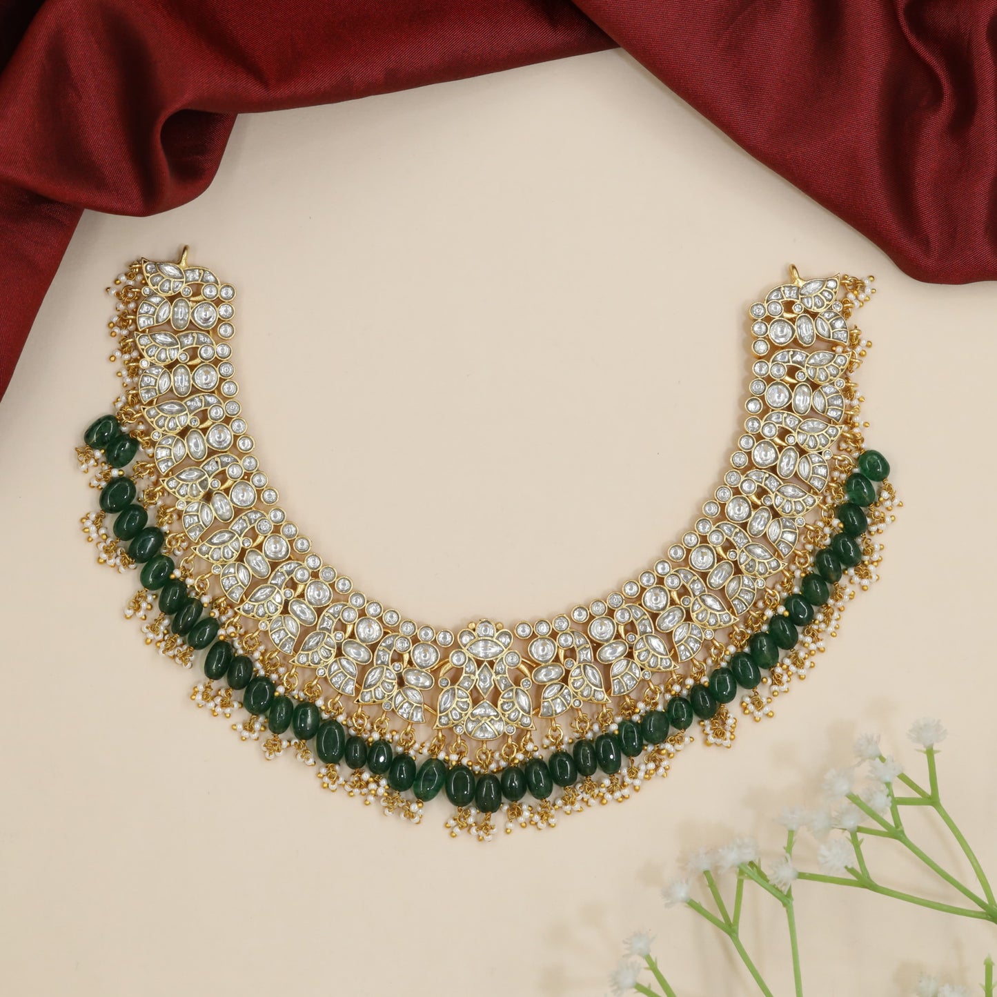 Grand kundan necklace with ornamental floral detailing
