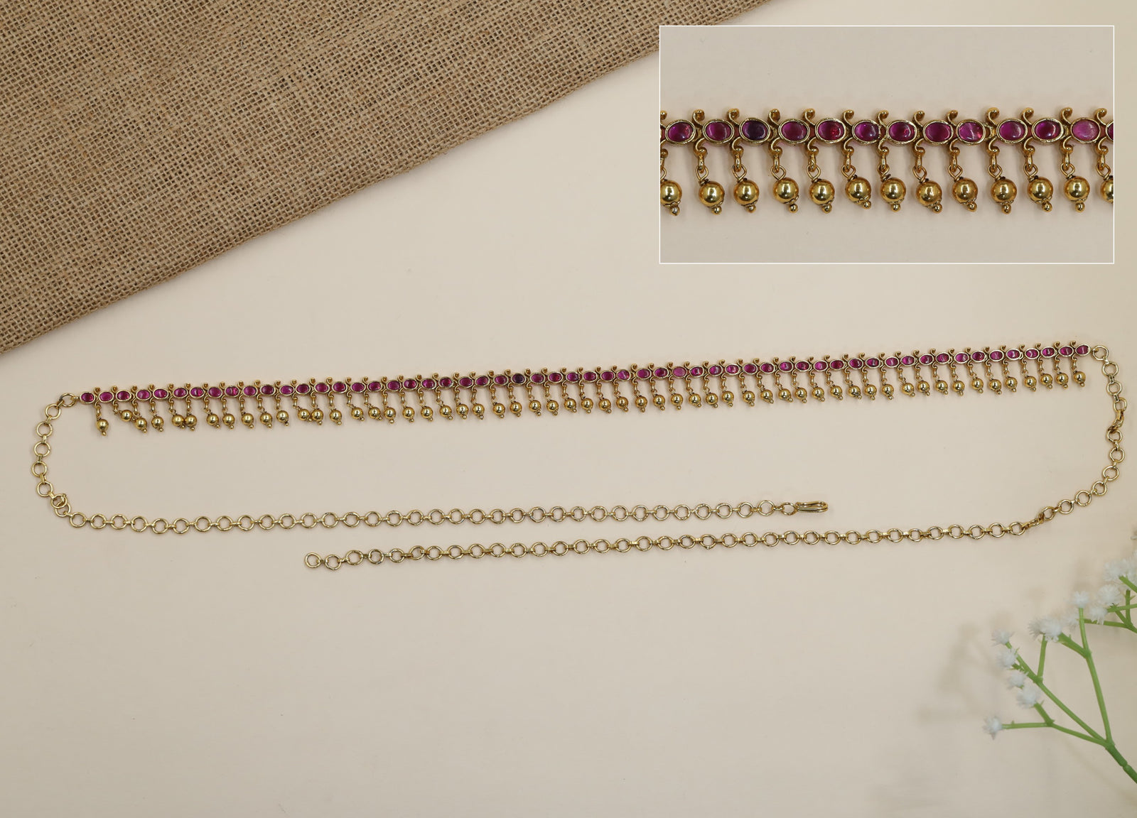 Grand antique waist belt with continuous oval design and hanging ghungroos