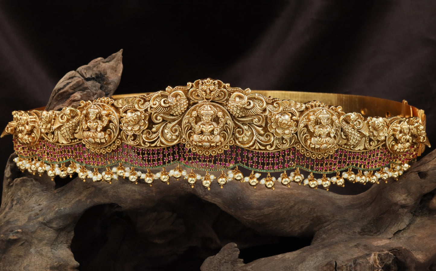 Prestige waist belt with embossed Lakshmi medallions and fringe