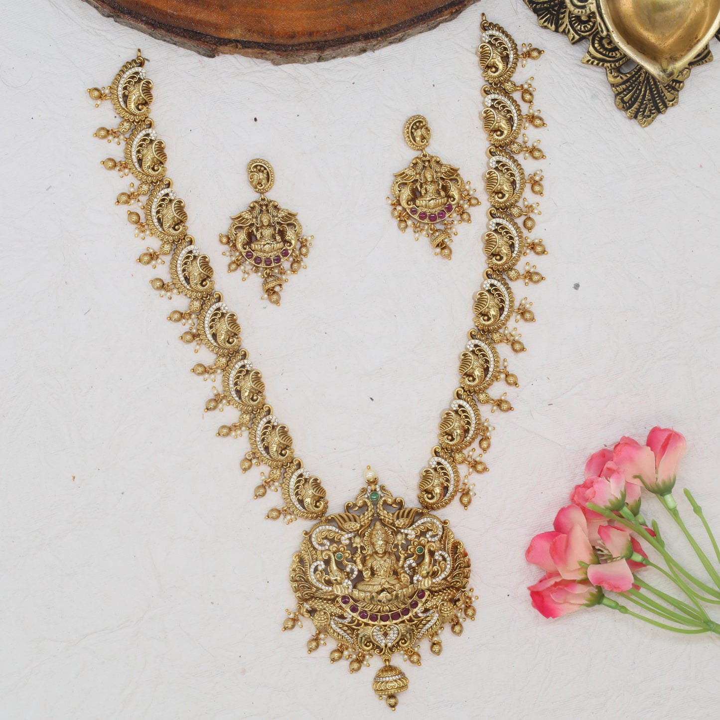 Designer long necklace with Lakshmi centre and ornate chain layout
