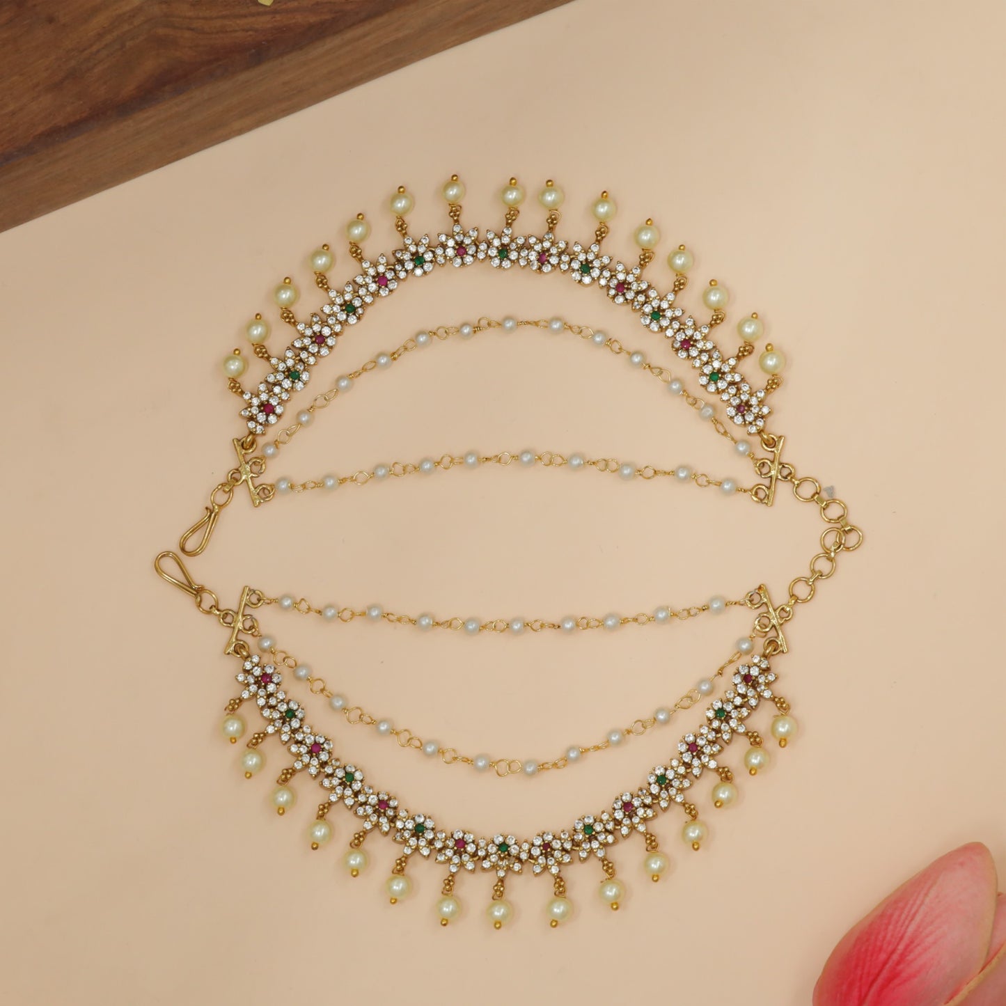 Elegant mati with structured curve and delicate bead hangings