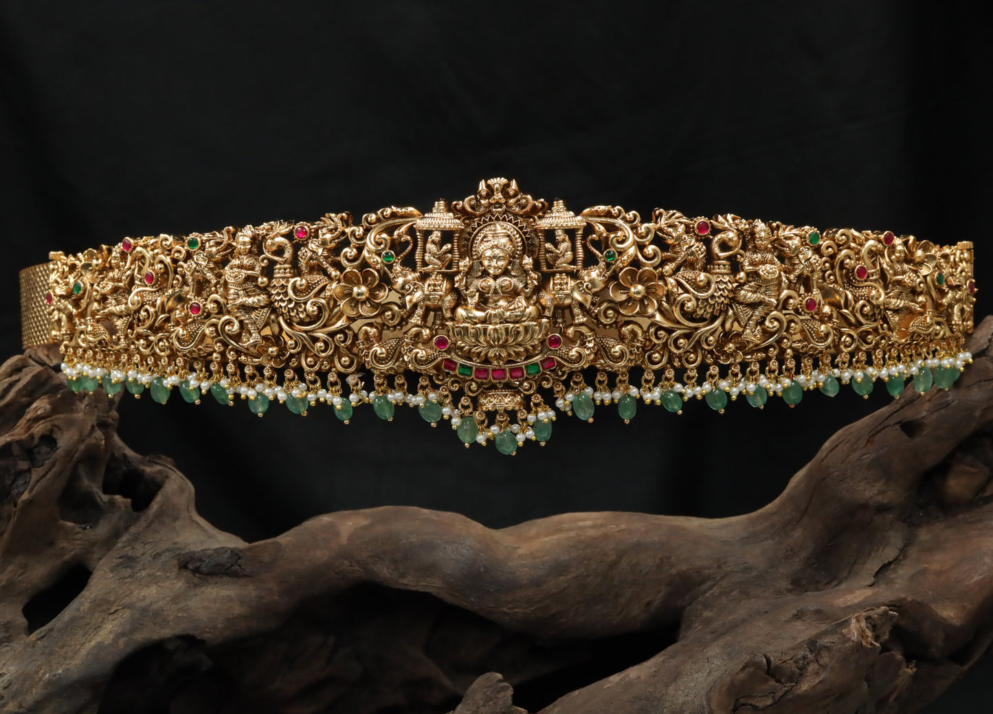 Grand Antique dabu with sculpted temple motifs and bead fringe