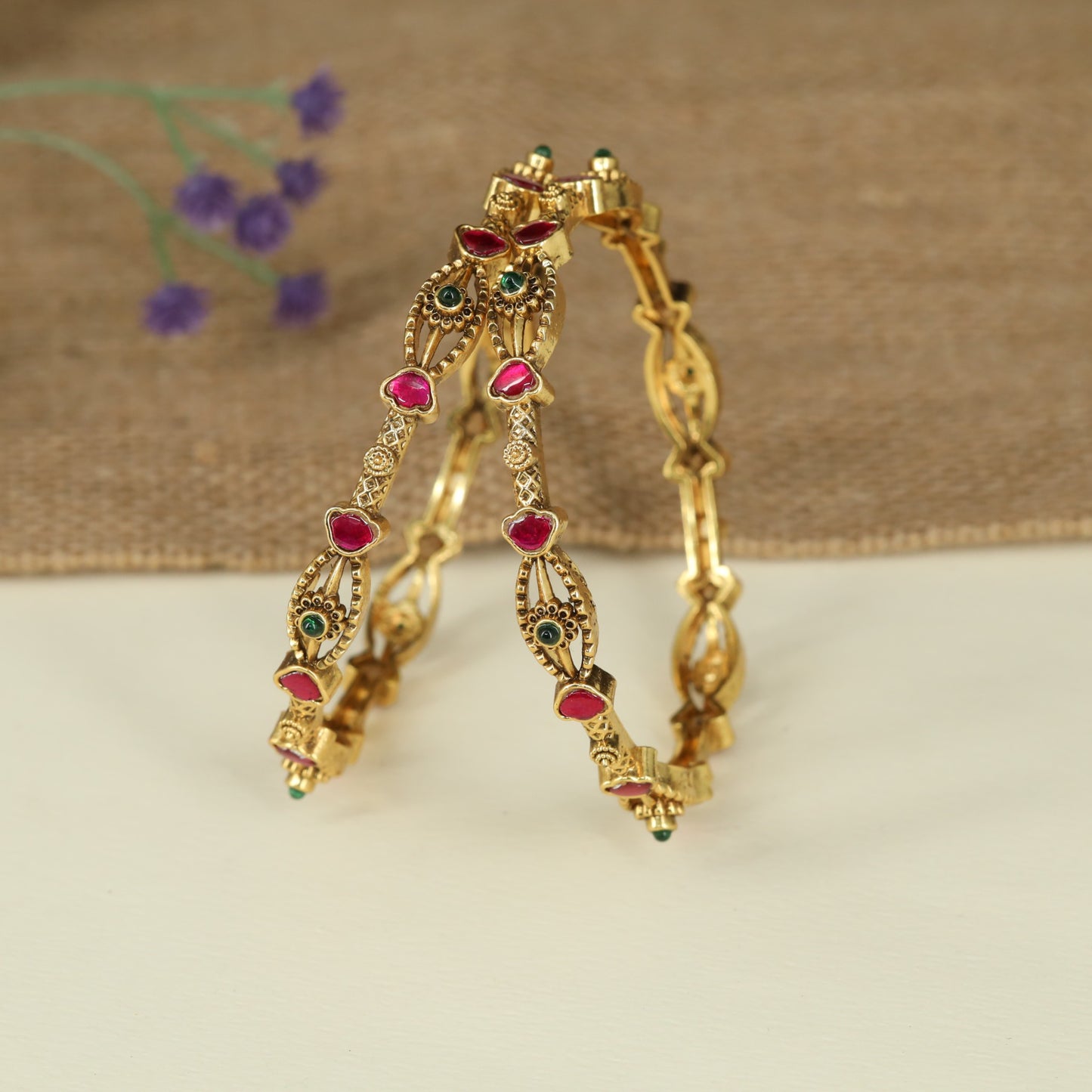 Elegant Antique Bangles with Decorative Marquise Frames and Scroll Detailing
