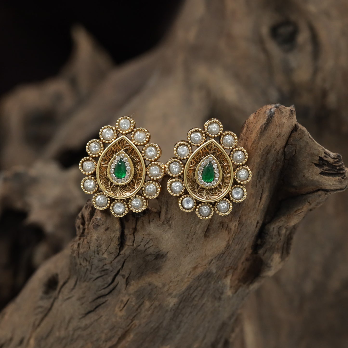 Antique Stud Featuring a Teardrop Centre and Circular Pearl Halo