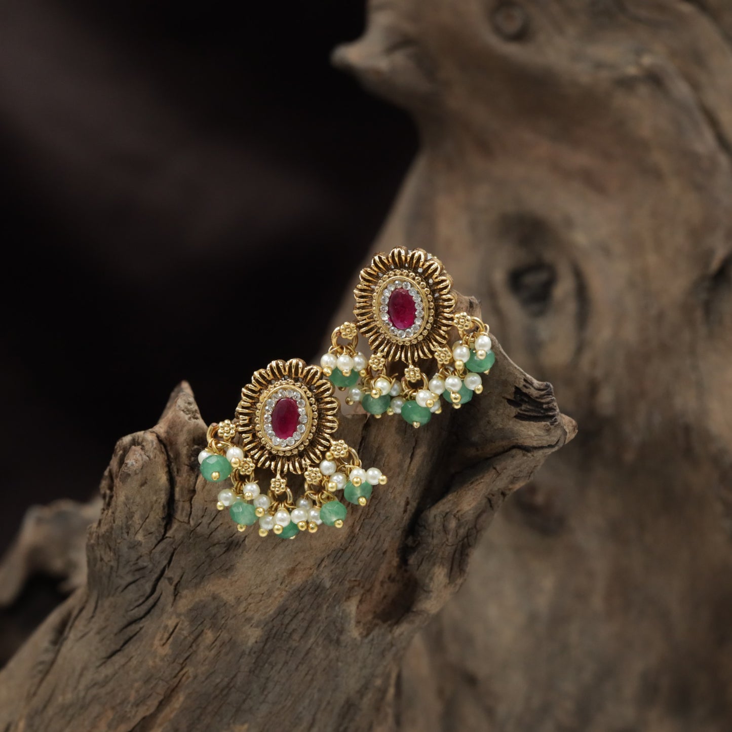 Antique Stud Featuring a Sunburst Design and Pearl Cluster Fringe