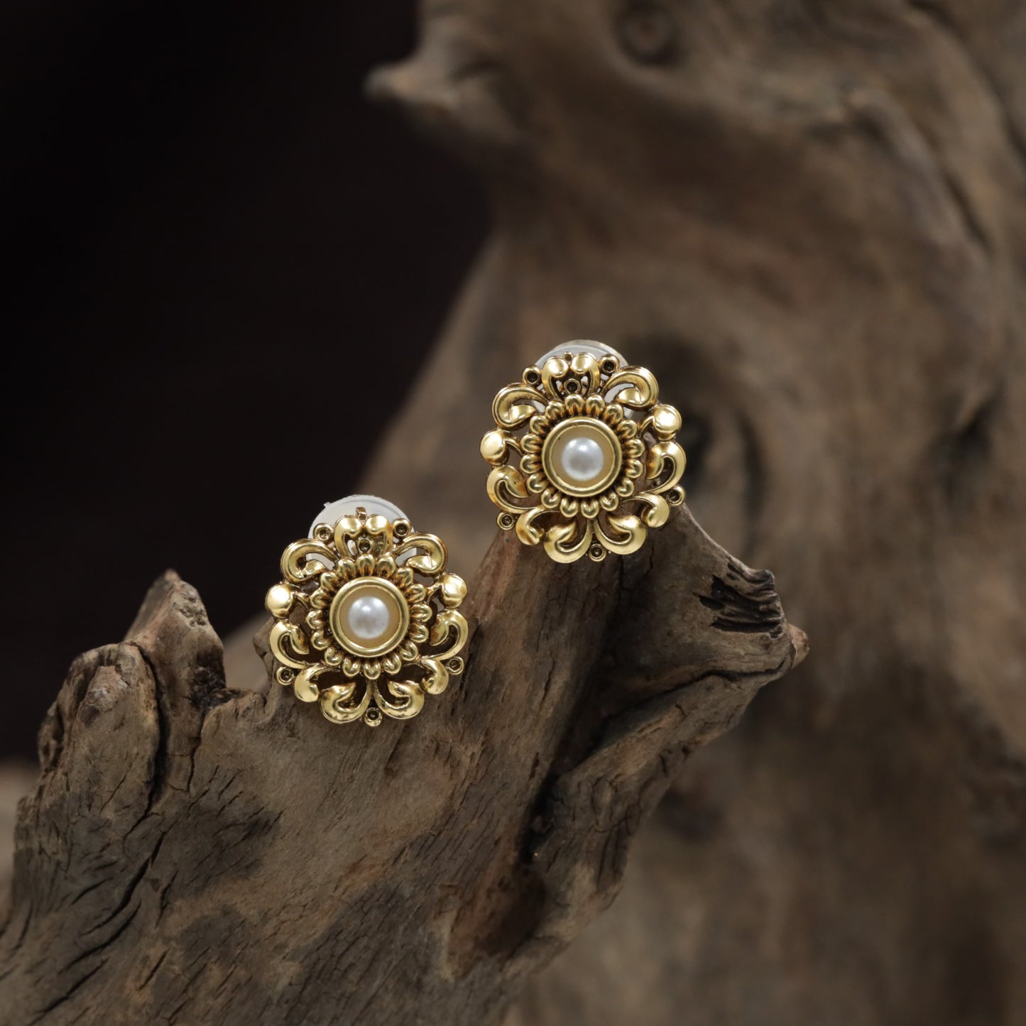 Antique Floral Stud With Ornate Scrollwork And Center Accent