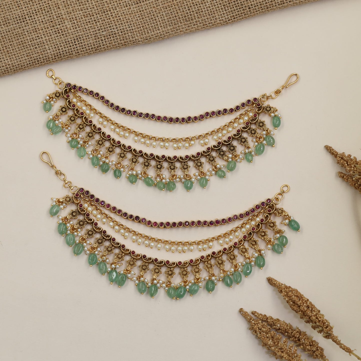 Traditional Antique Mati with Repeating Floral Details and Cascading Drops