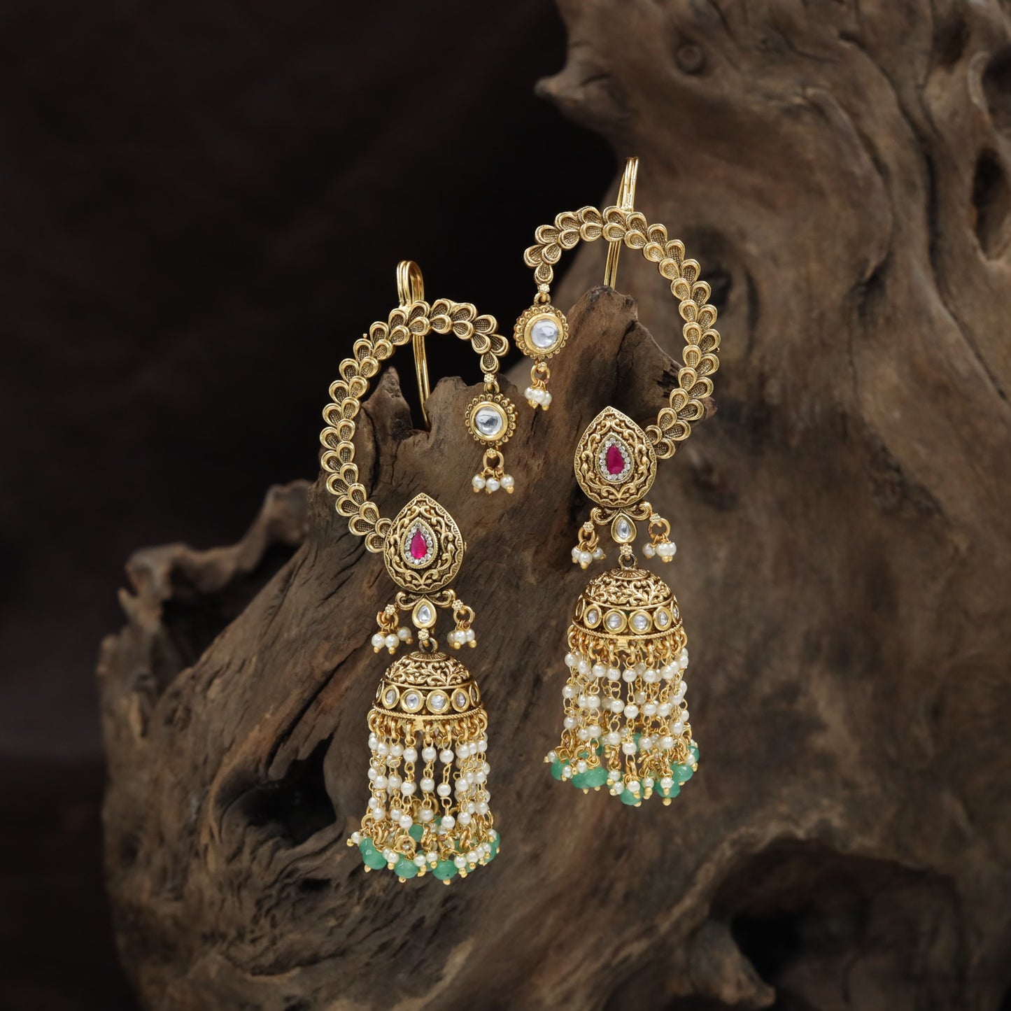 Intricate Floral Hoop Paired with Teardrop Studs in This Antique Cuff-Jumka