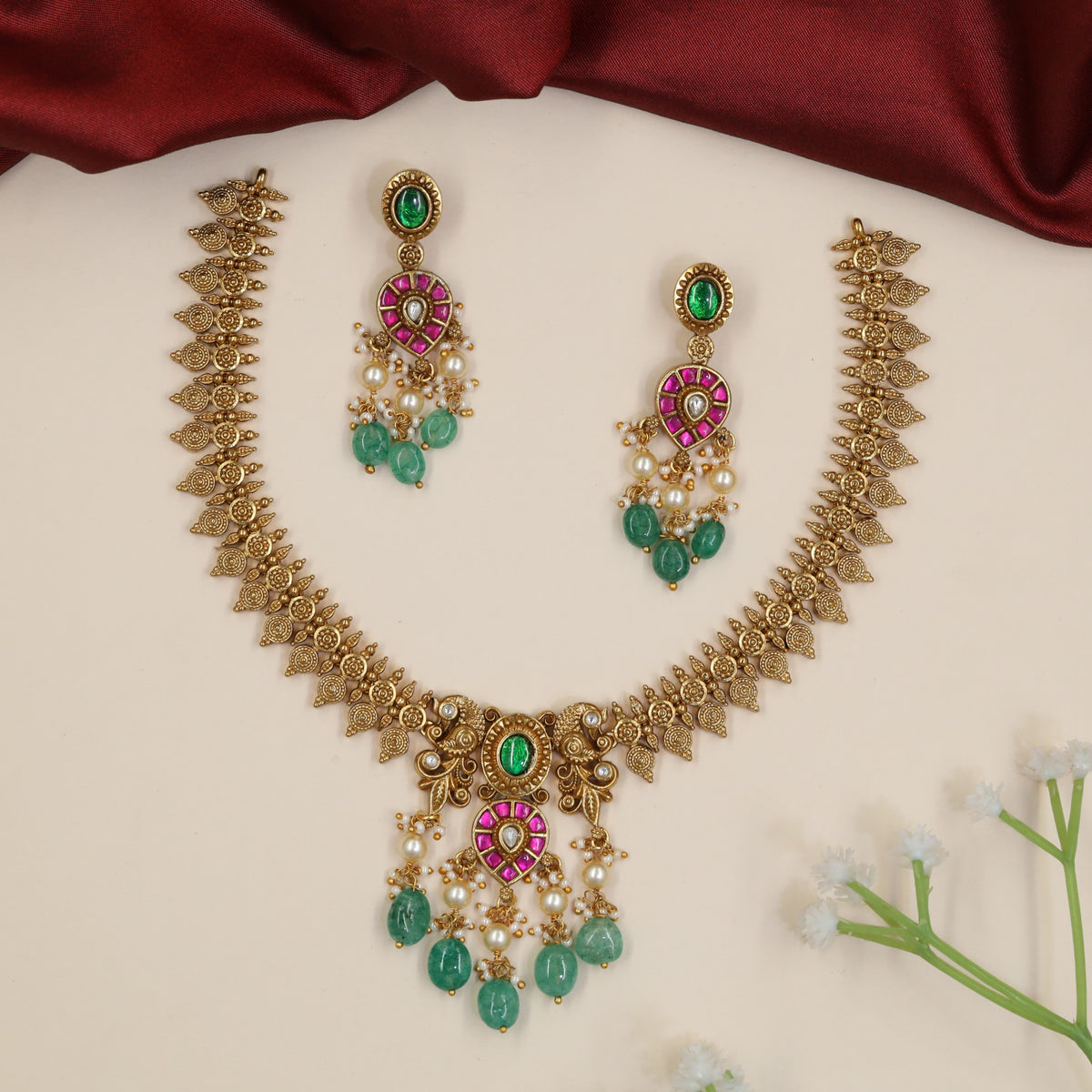 Festive Jadau Necklace with Intricate Leaf Panels