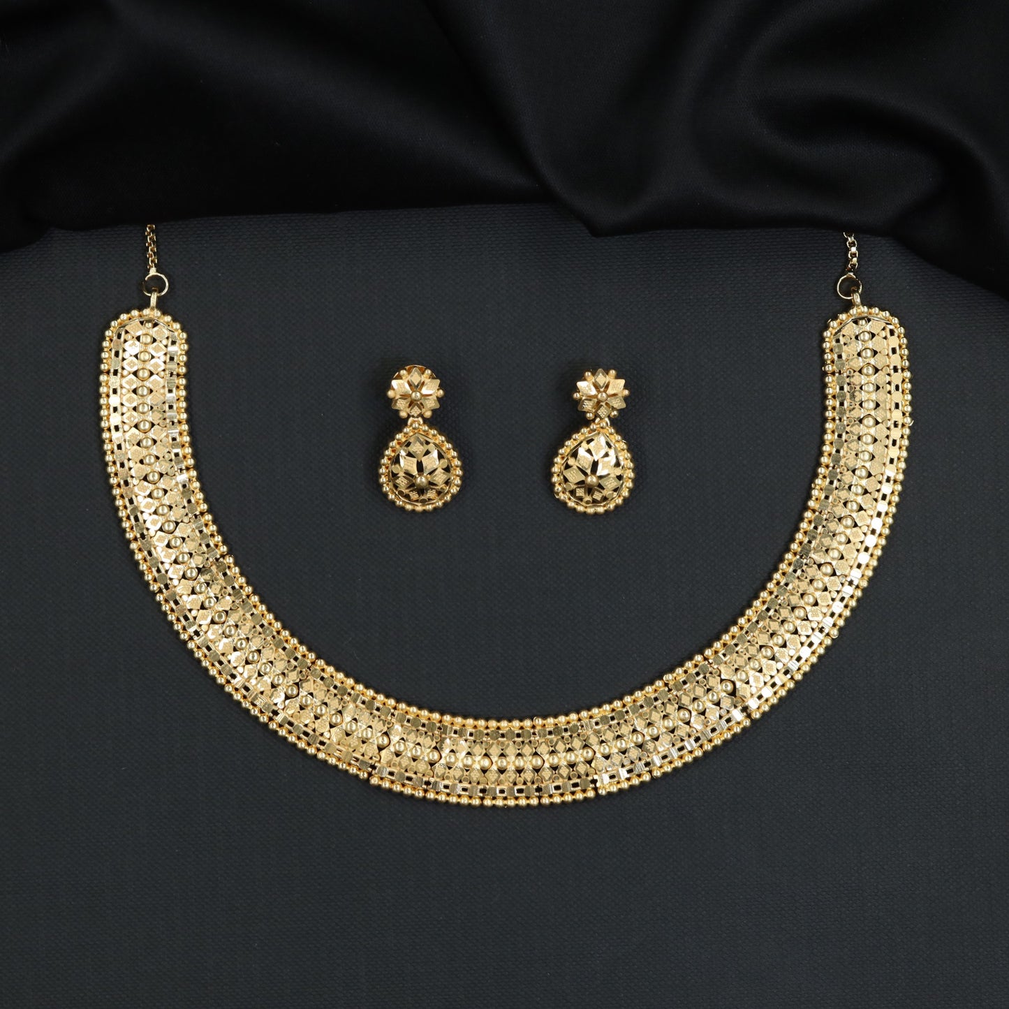 Forming Necklace with Broad Geometric Openwork