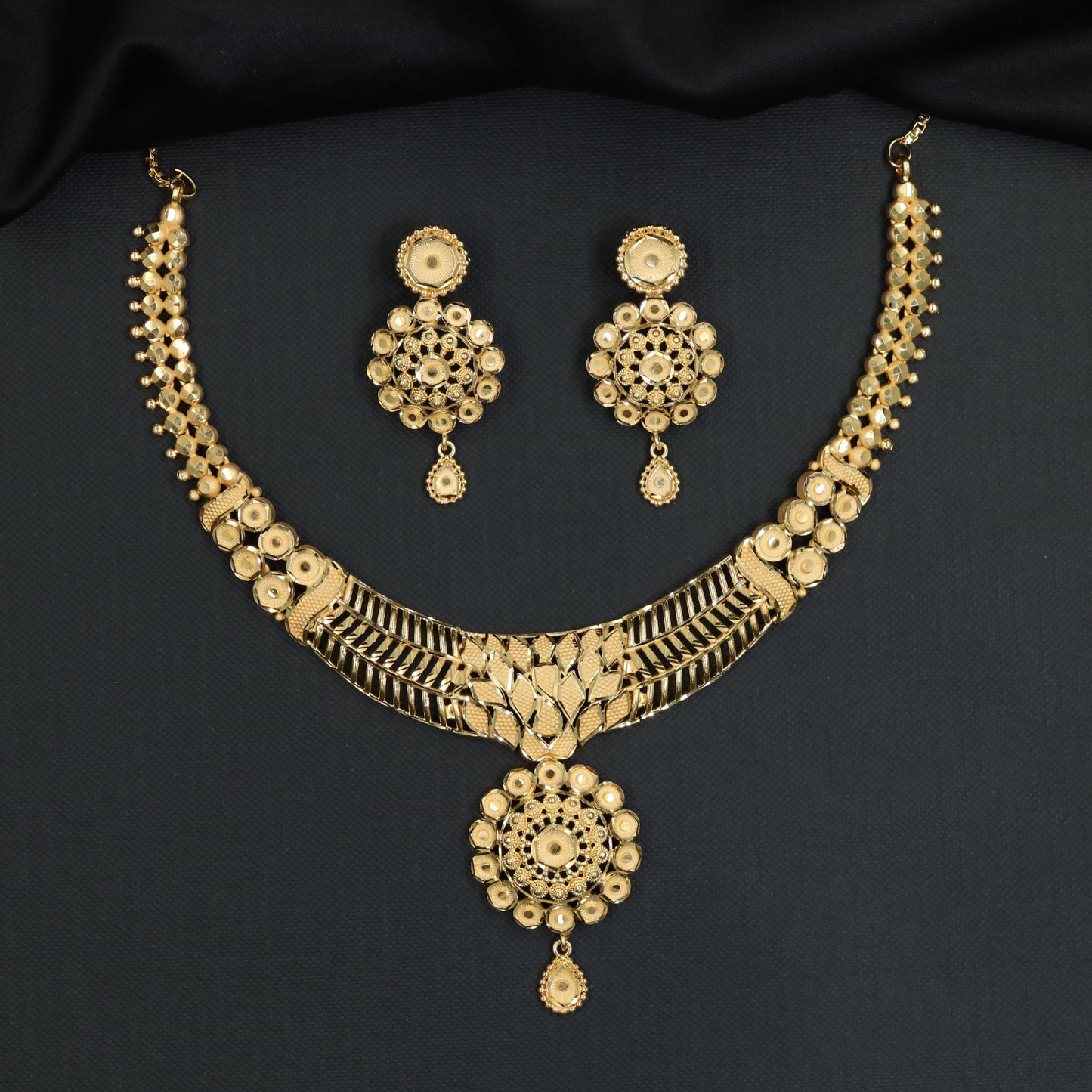 Forming Necklace with floral rosette medallion and lotus leaf collar