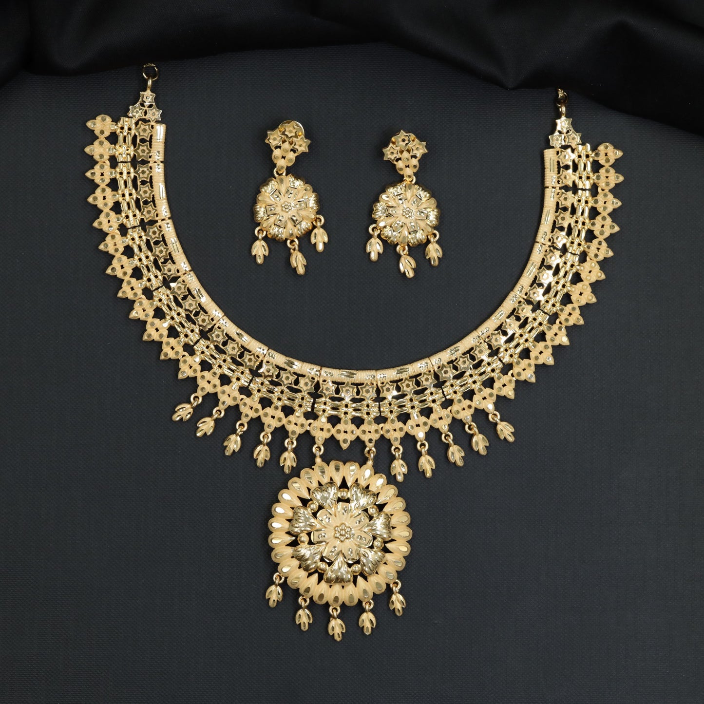 Grand festive Forming Necklace featuring radiating sunburst floral crest